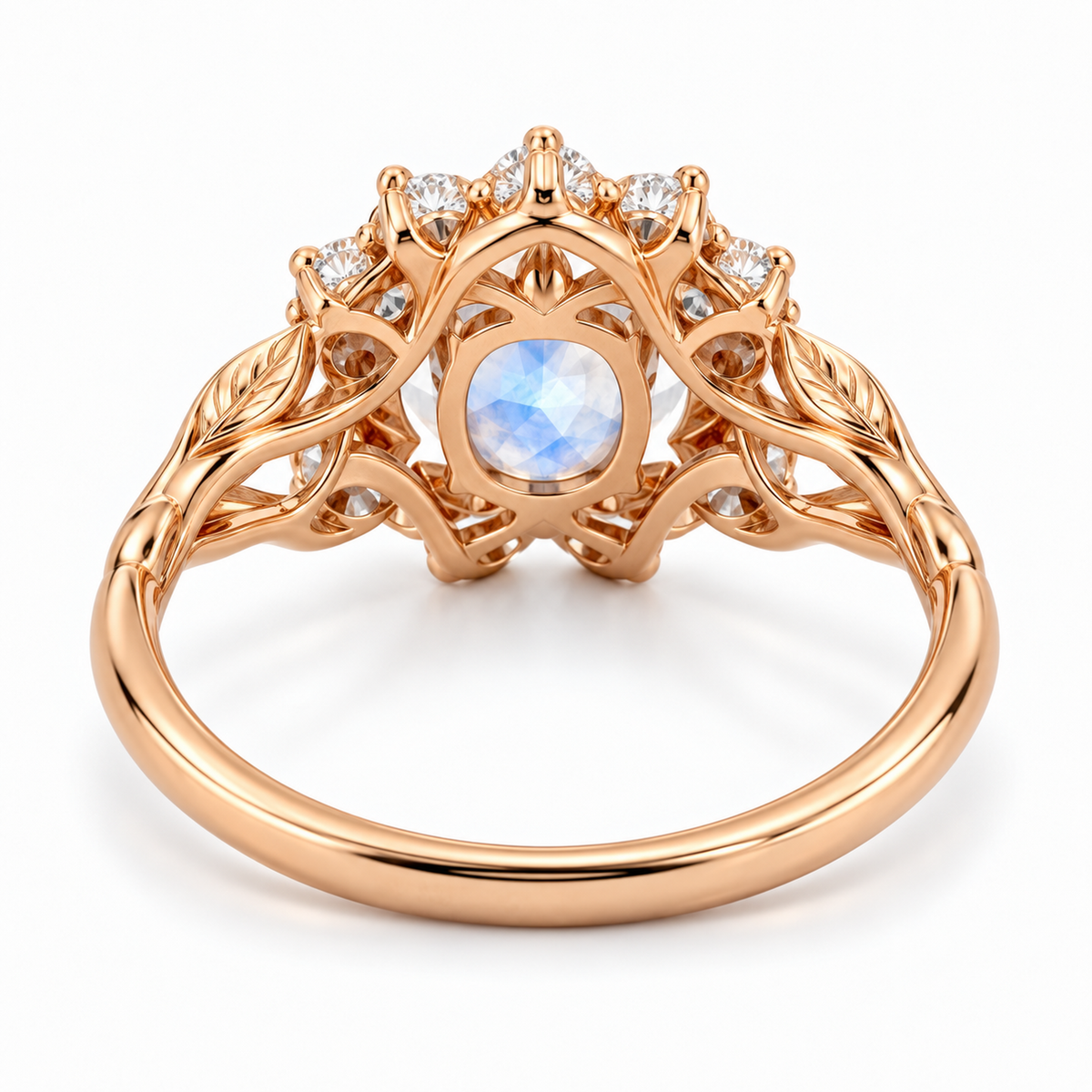 Rose gold moonstone engagement ring with botanical vine band
