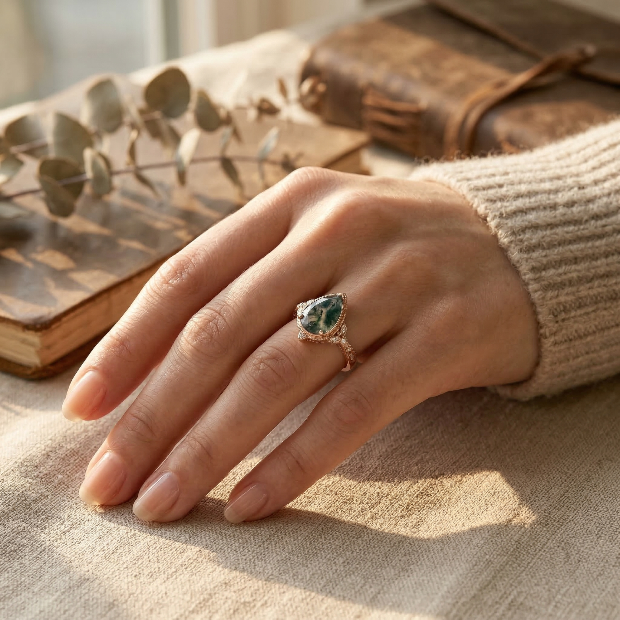 Detailed view of Pear Moss Agate Engagement Ring in Rose Gold