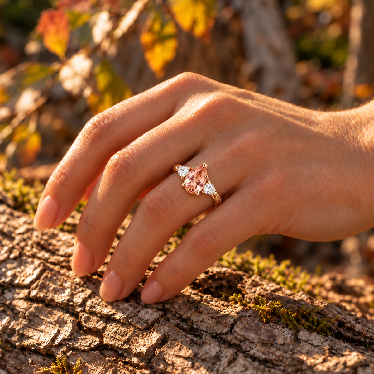 6x8mm pear morganite engagement ring in rose gold with moissanite side stones