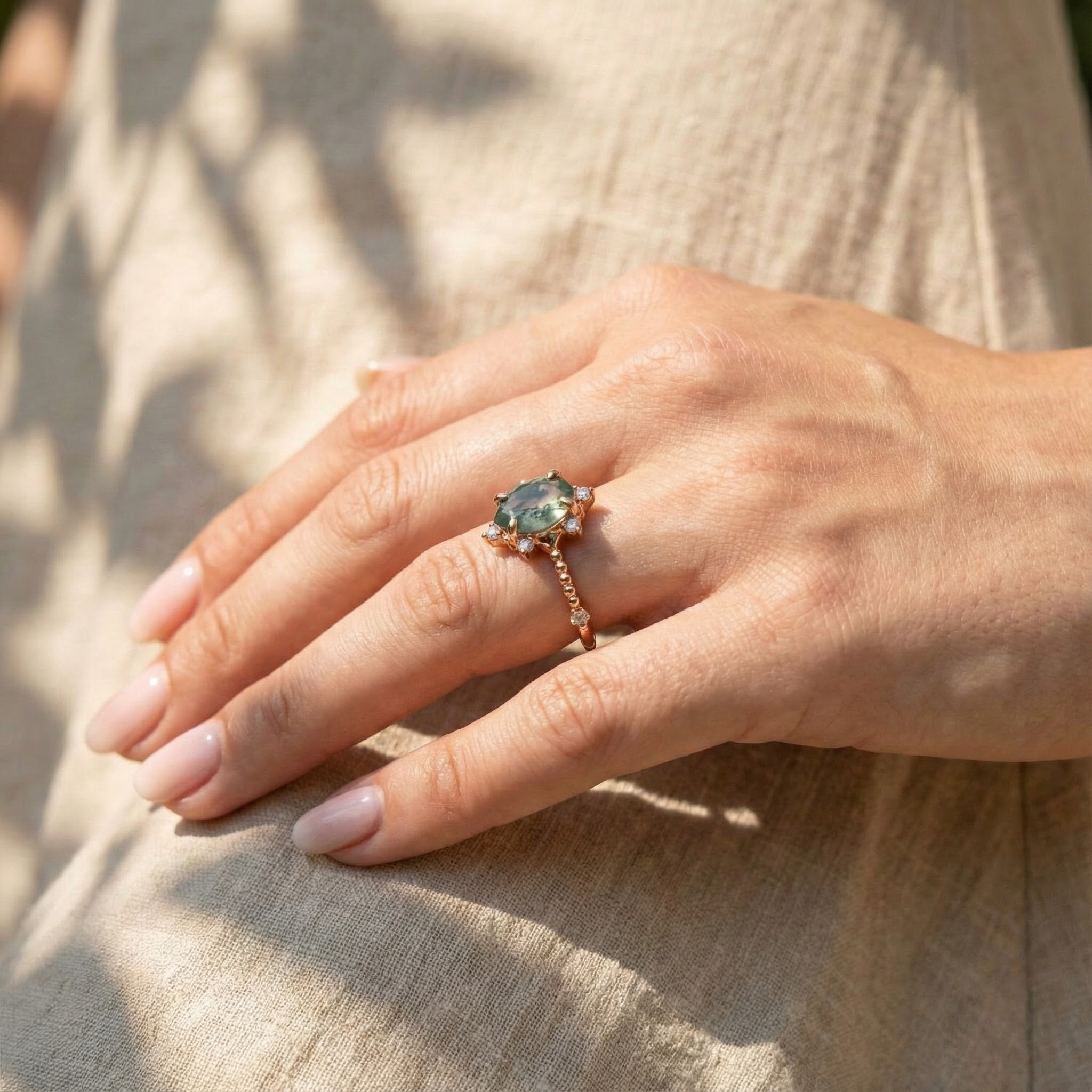 Detailed view of Pear Moss Agate Engagement Ring in Gold