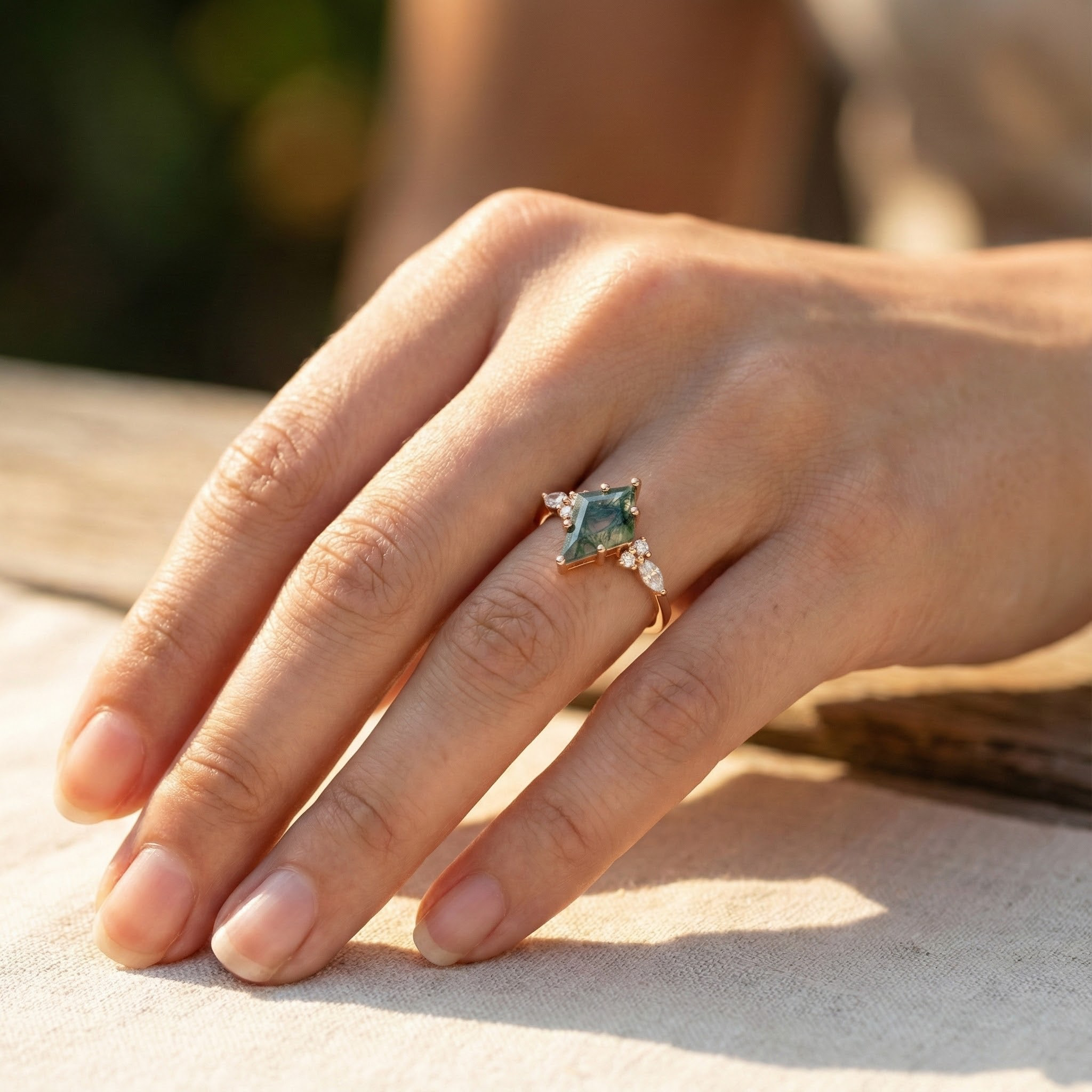 Detailed view of Kite Cut Moss Agate Engagement Ring in Gold