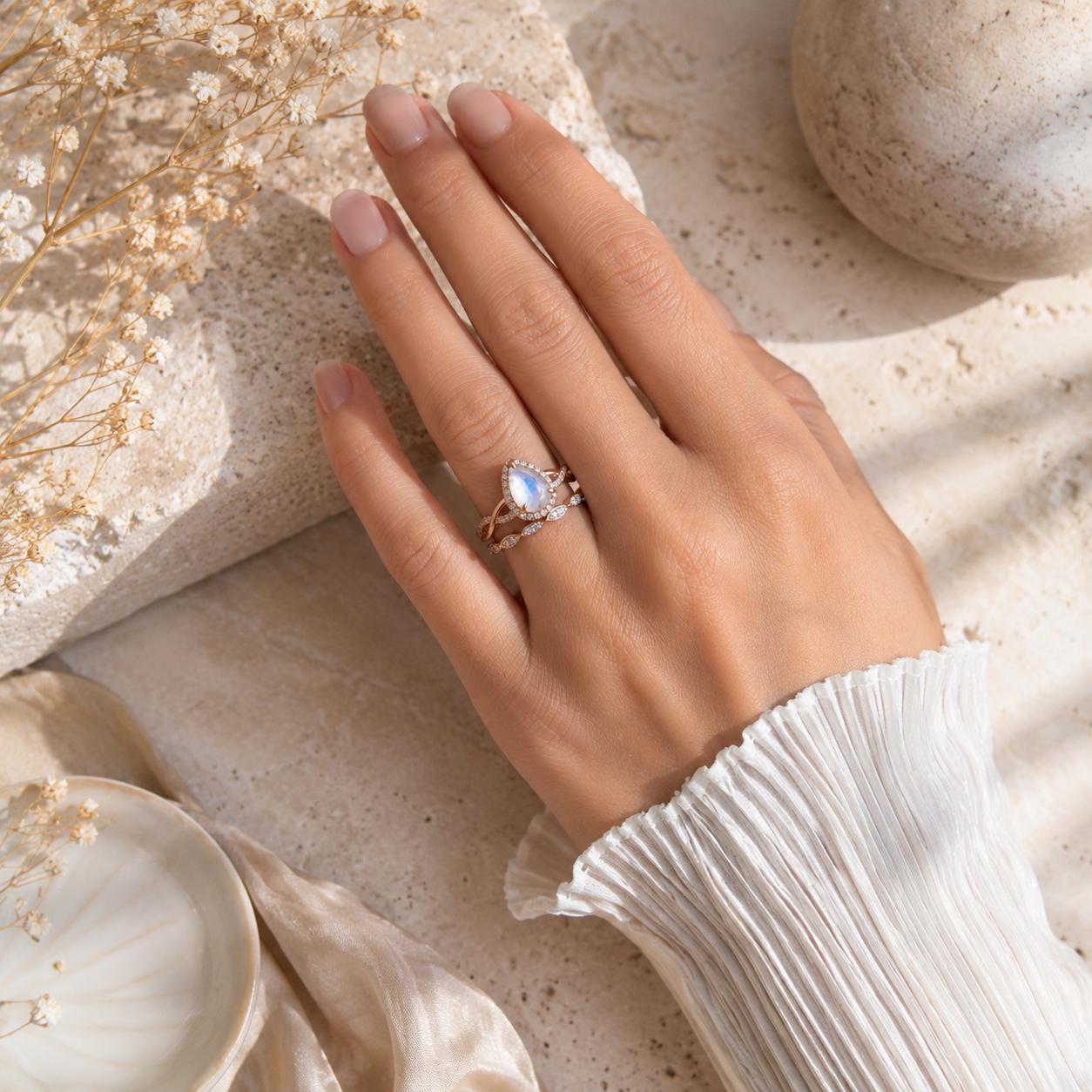 pear-moonstone-bridal-set-twisted-moissanite-band