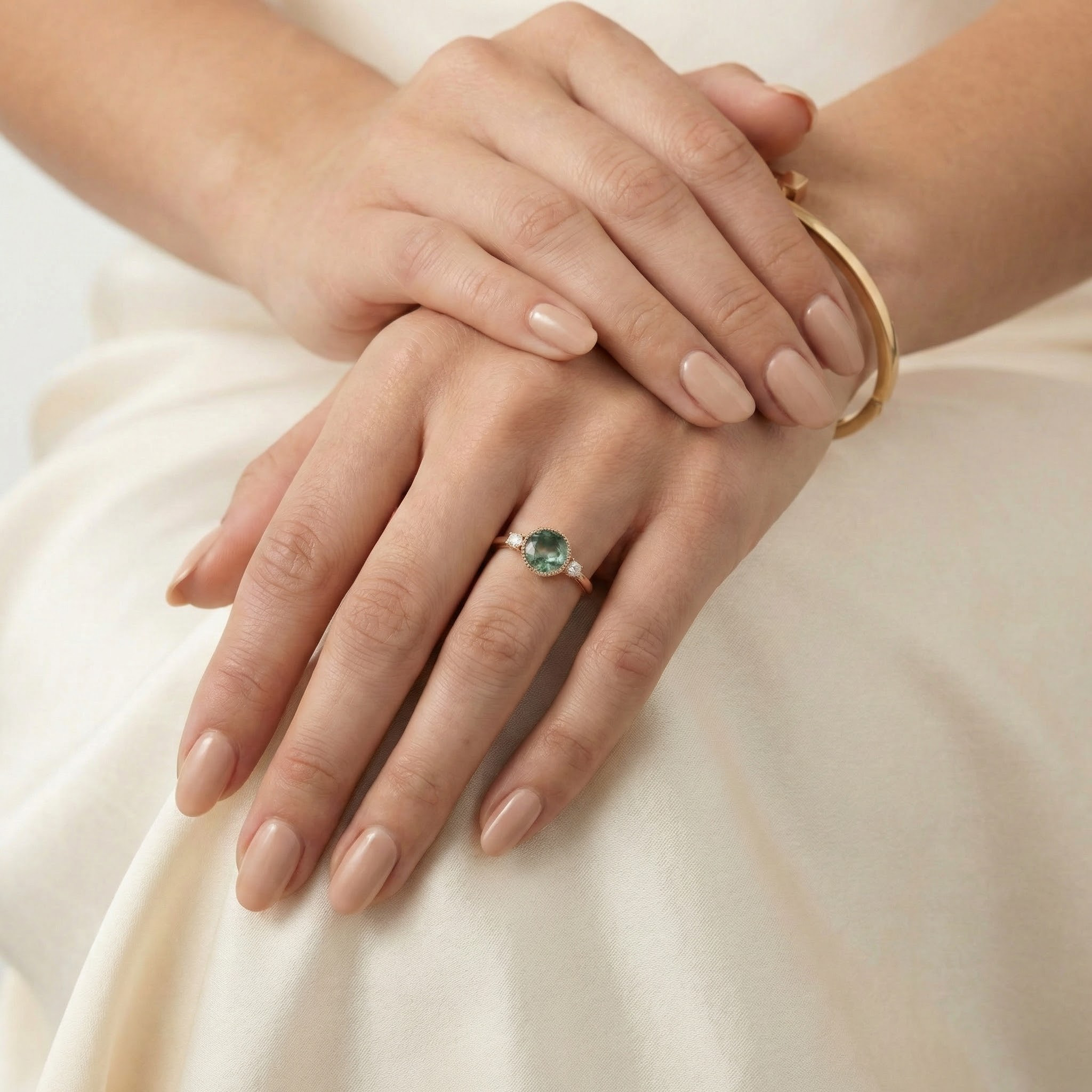 Angled view of Round Moss Agate Engagement Ring in Gold