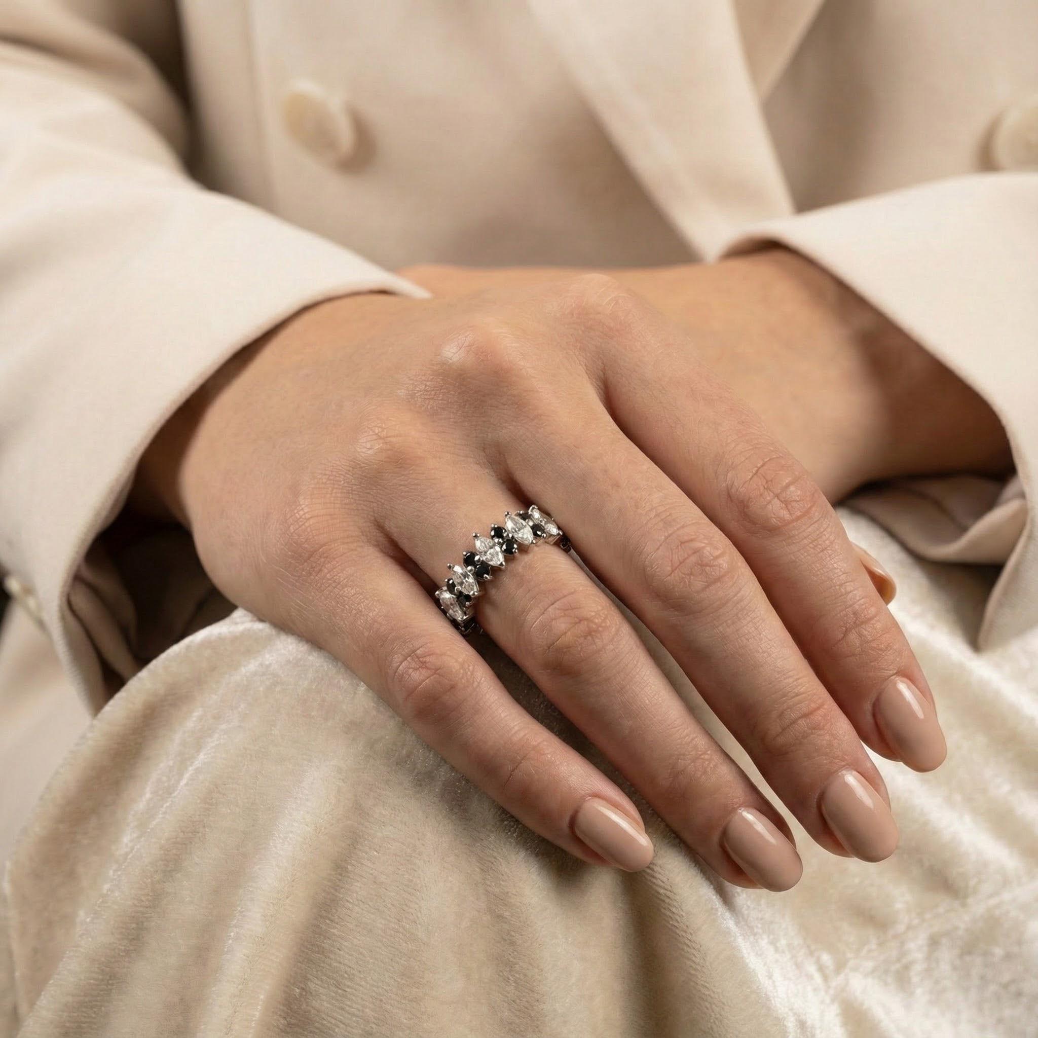 Luxurious marquise black onyx band featuring shimmering moissanite gemstone.