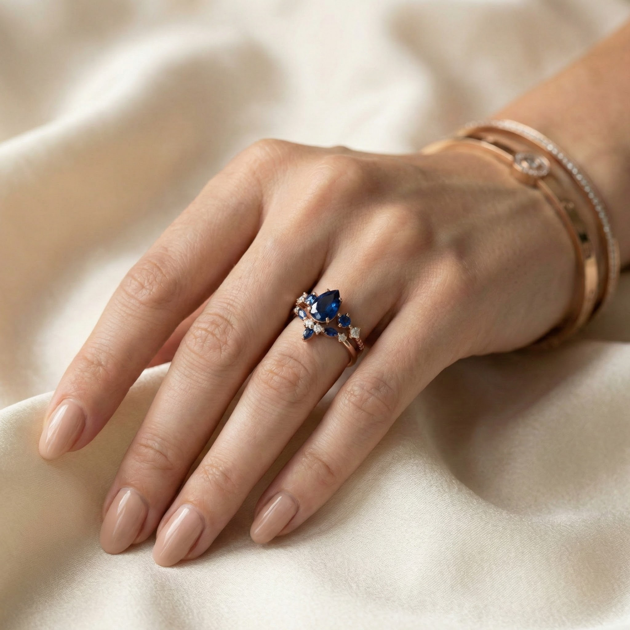 Detailed view of Pear Sapphire Ring Set in Gold