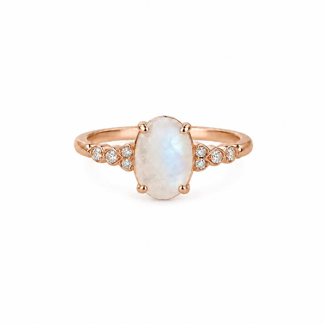 Oval moonstone ring in rose gold with moissanite accents