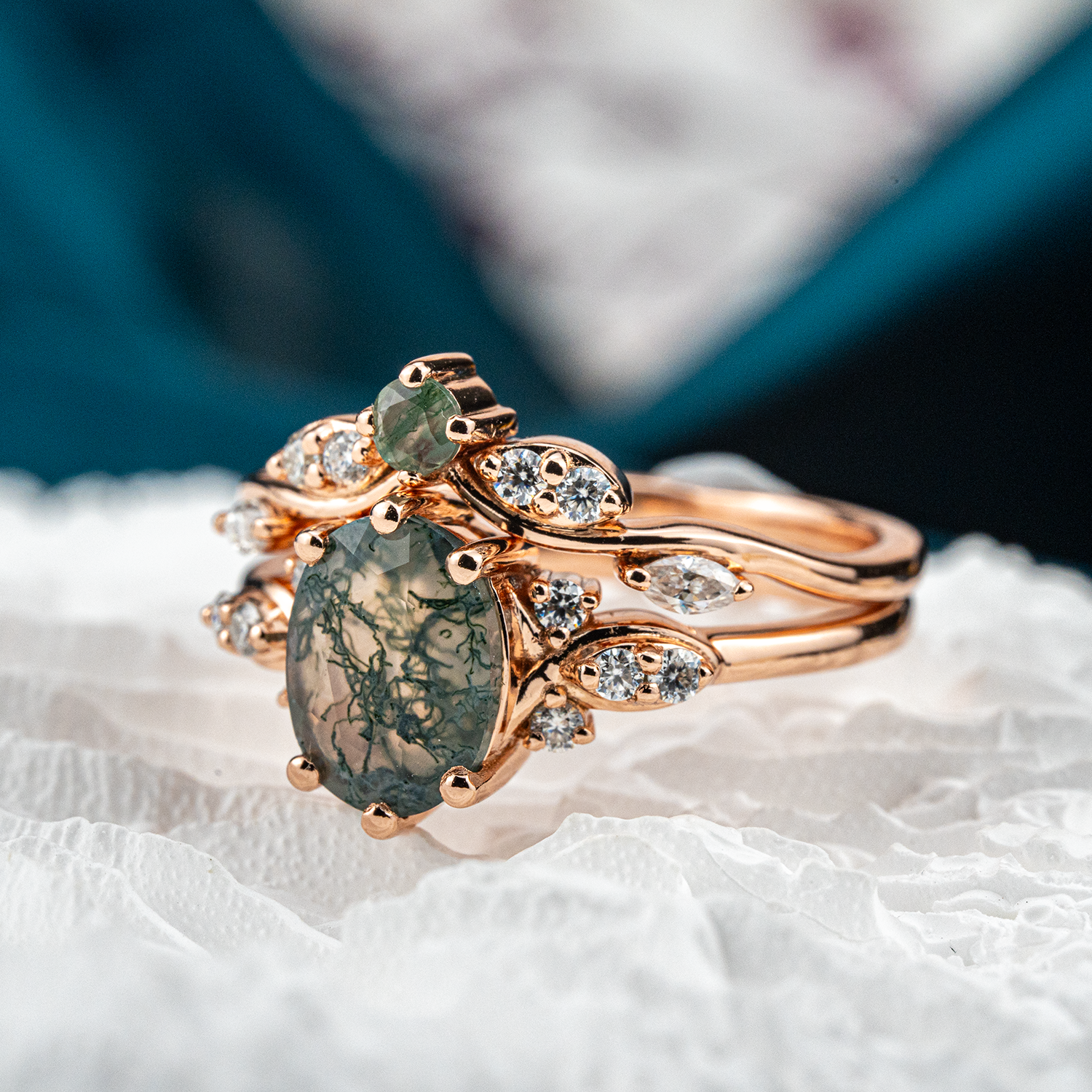 Elegant jewelry set with oval moss agate stones, moissanite gems in a nature-inspired design