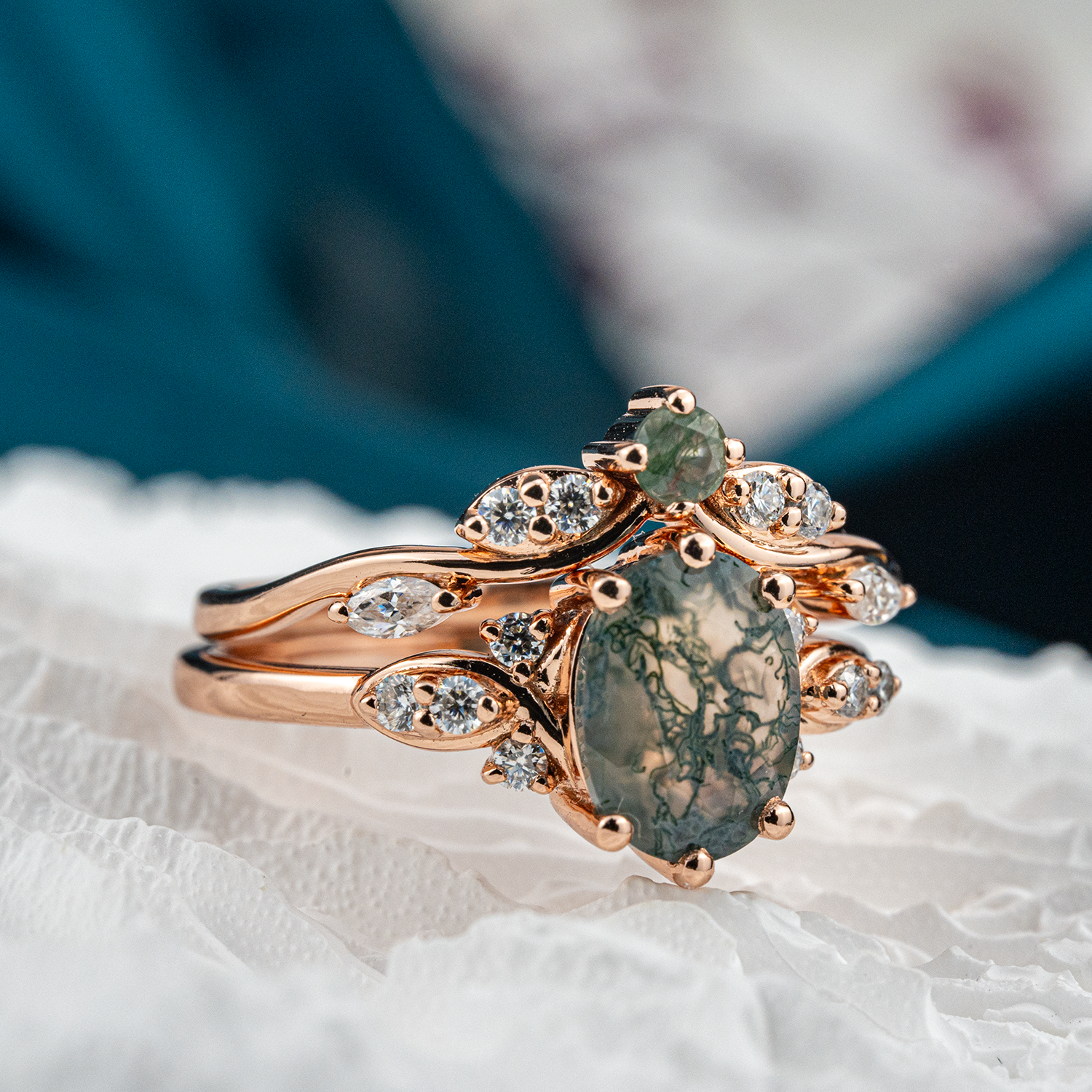 Elegant jewelry set with oval moss agate stones, moissanite gems in a nature-inspired design