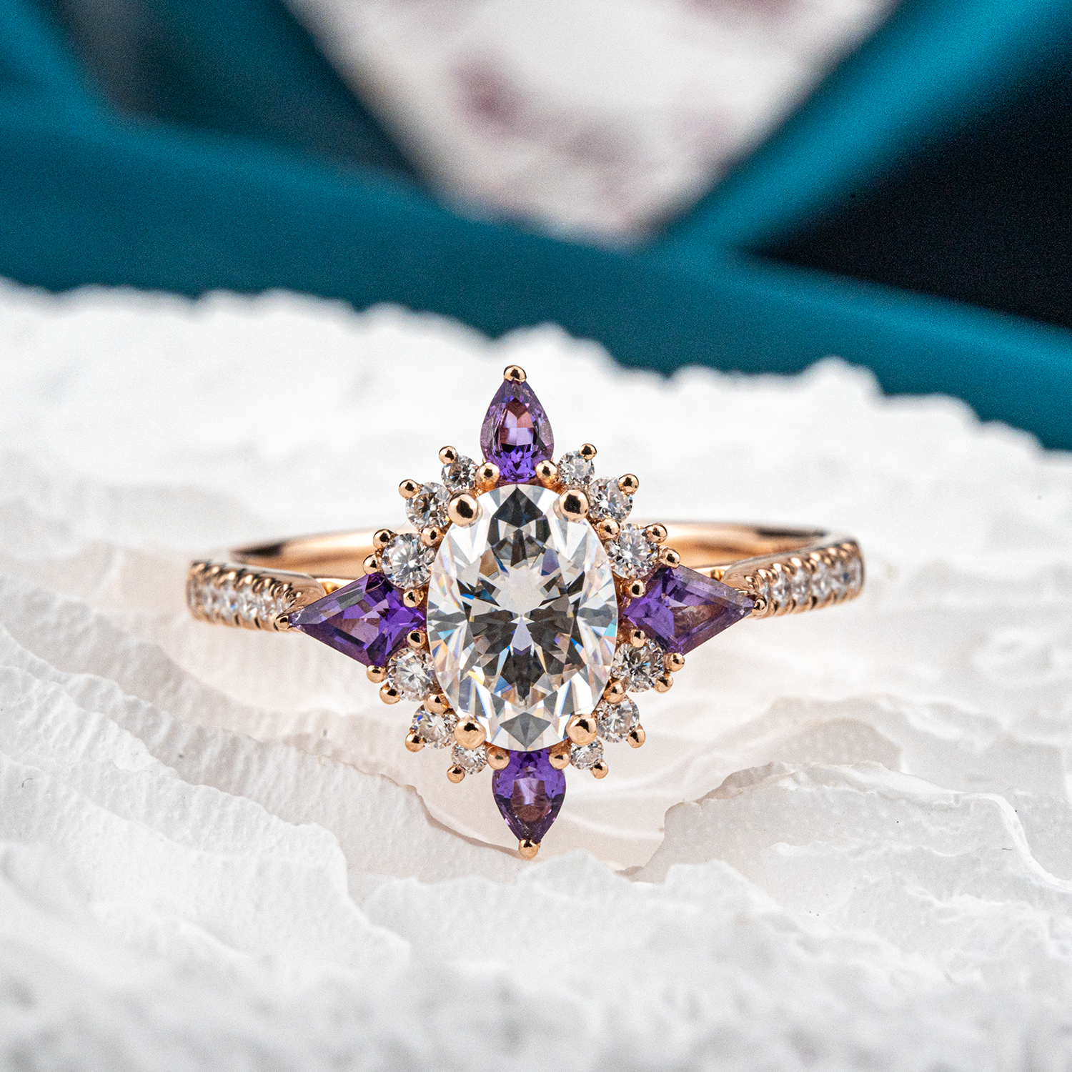 Beautiful oval moissanite gemstone ring with cross amethyst accents for elegant jewelry collection