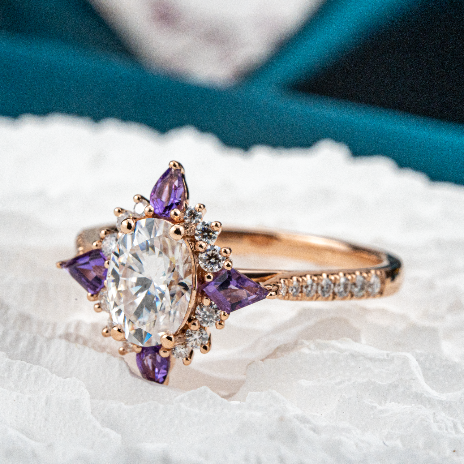 Beautiful oval moissanite gemstone ring with cross amethyst accents for elegant jewelry collection