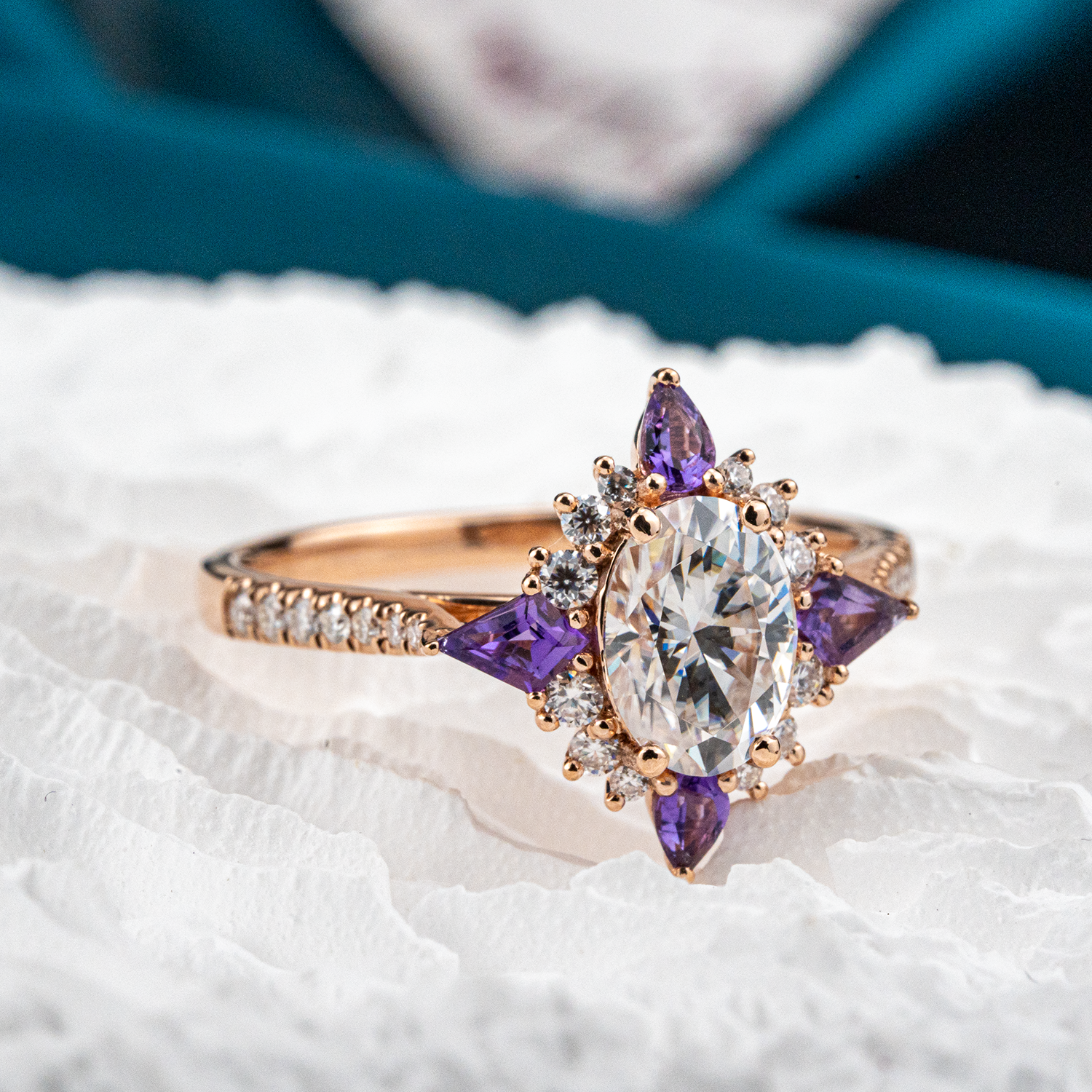 Beautiful oval moissanite gemstone ring with cross amethyst accents for elegant jewelry collection