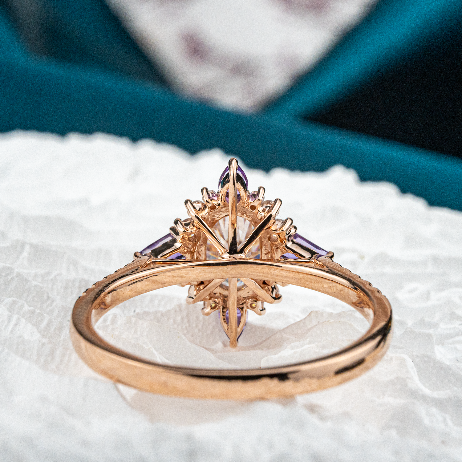 Beautiful oval moissanite gemstone ring with cross amethyst accents for elegant jewelry collection