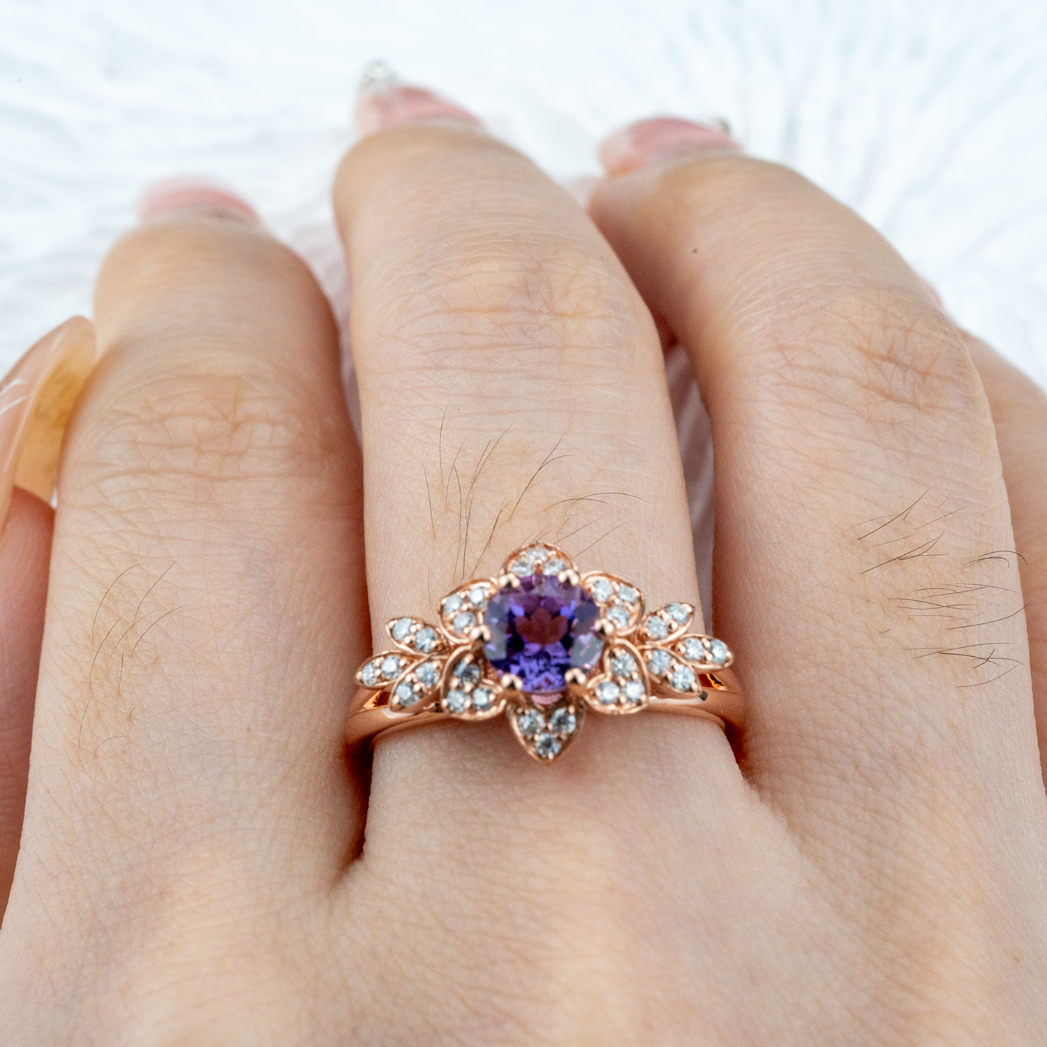 Exquisite round amethyst ring sparkling with luxury and elegance, perfect for a sophisticated touch.