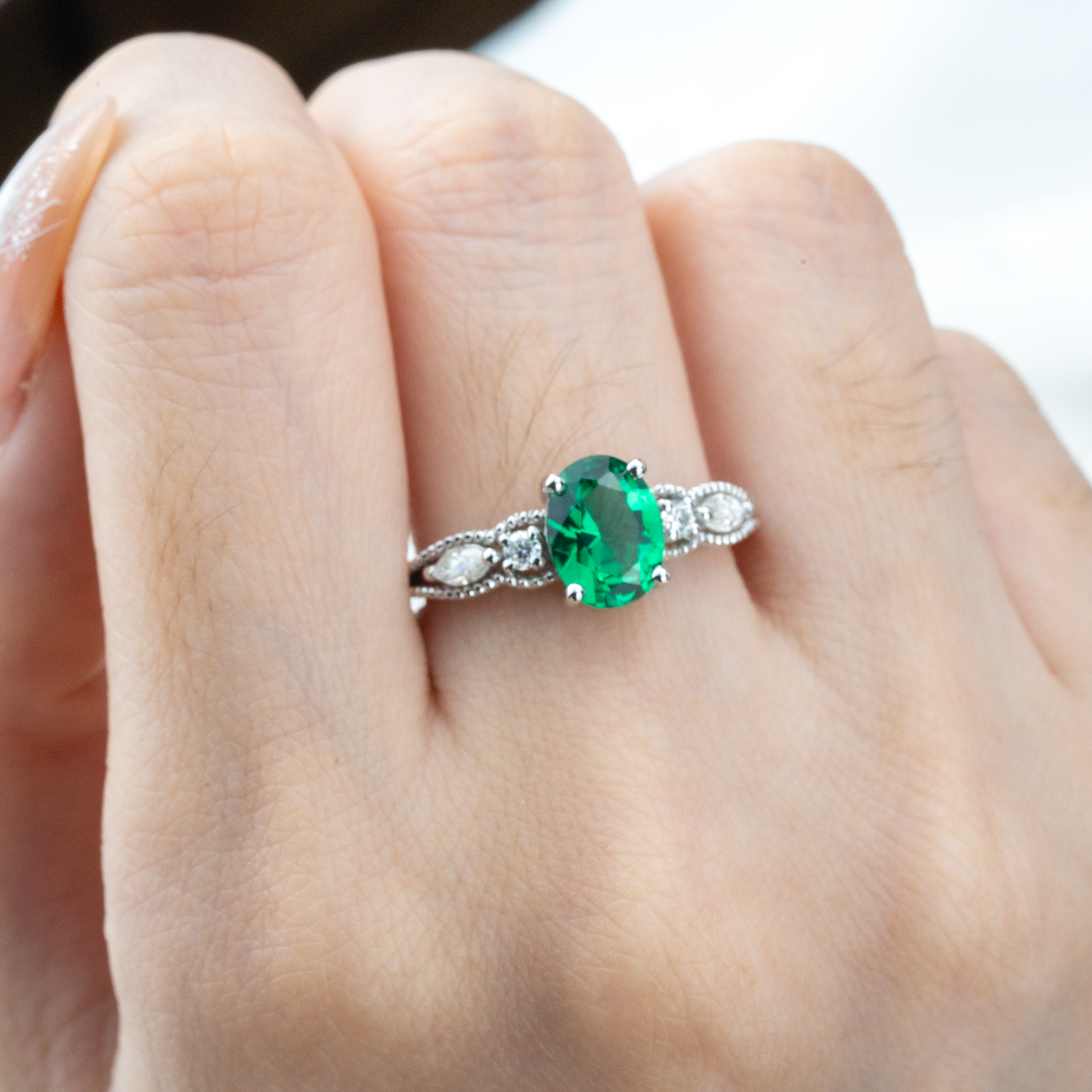 Shimmering Oval Emerald Ring in White Gold - Luxury Jewelry