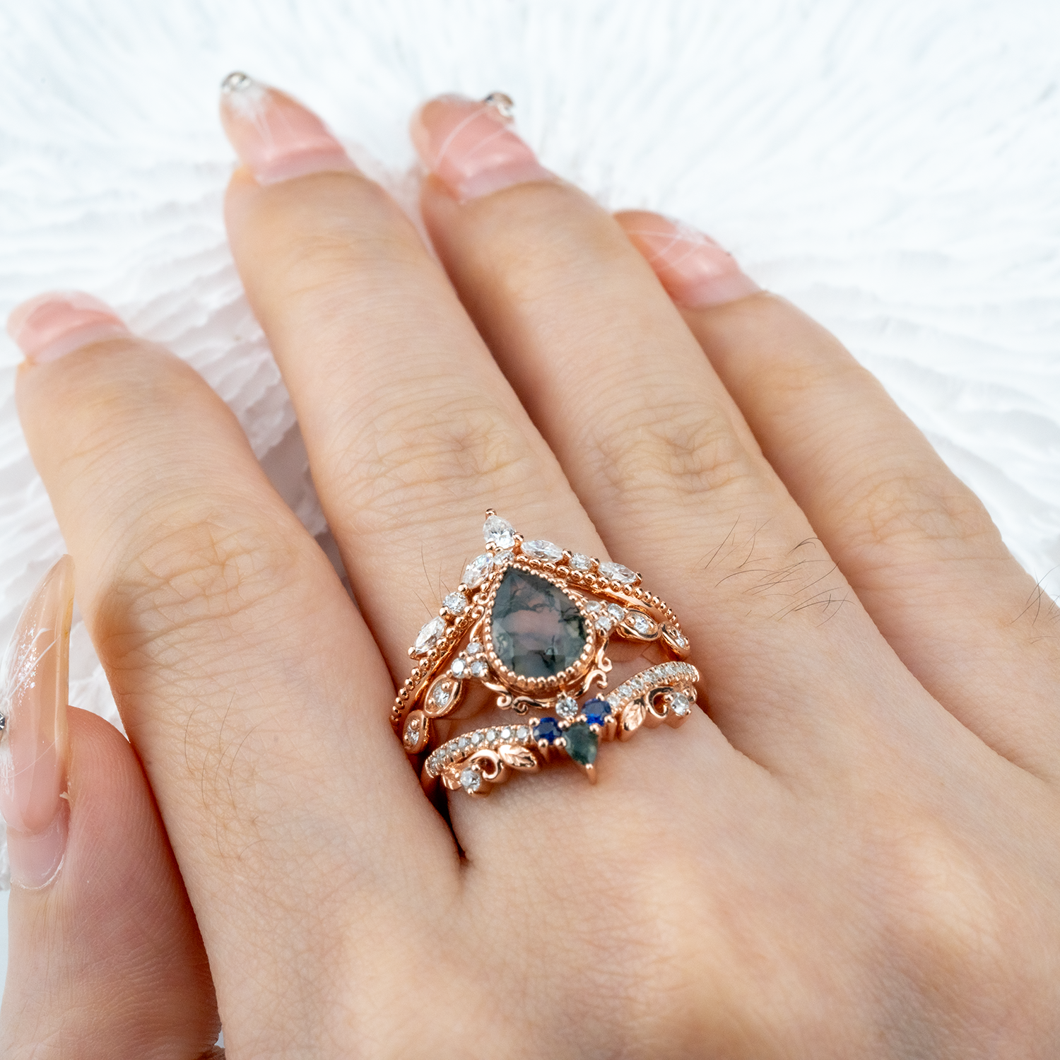 Exquisite wedding ring with pear moss agate stone, nature-inspired leaf design - luxurious and stunning