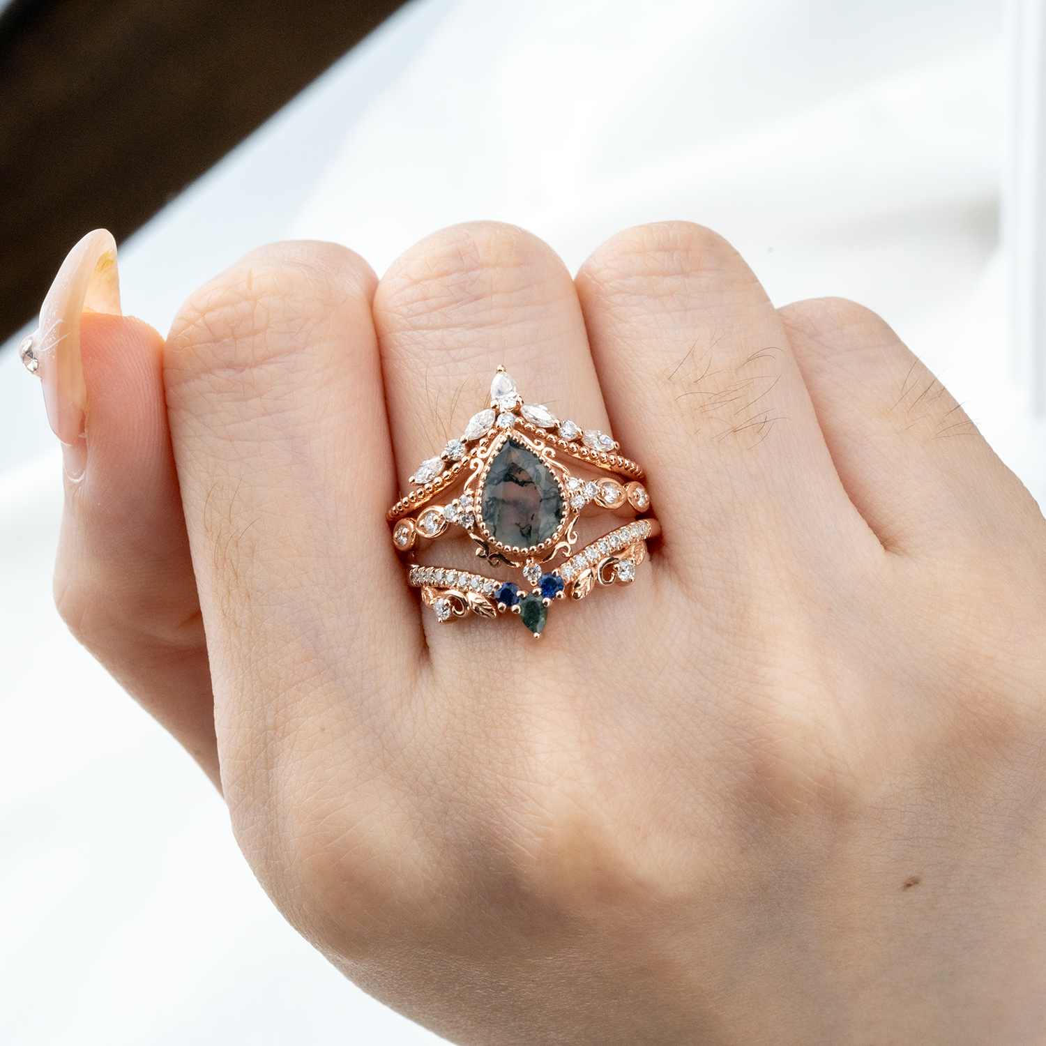 Exquisite wedding ring with pear moss agate stone, nature-inspired leaf design - luxurious and stunning