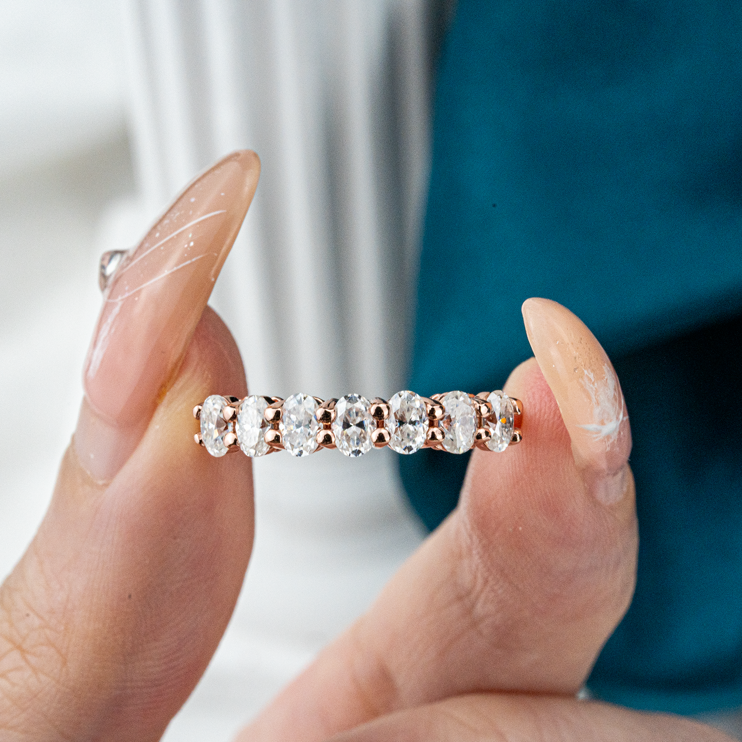Oval Moissanite Band Wedding Ring - Unique design for sophisticated brides.