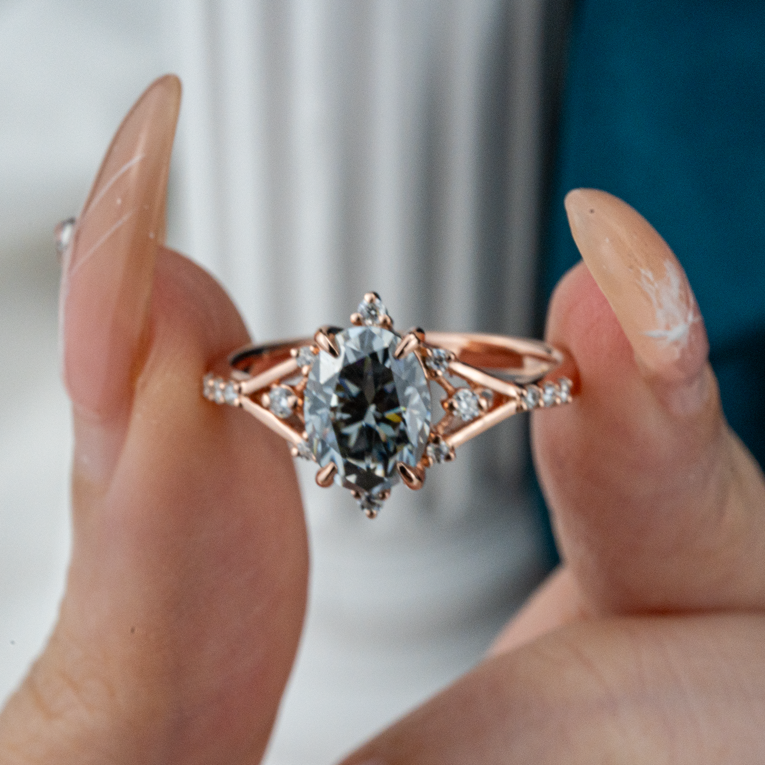 Stylish minimalist wedding band featuring an oval gray stone, chic design
