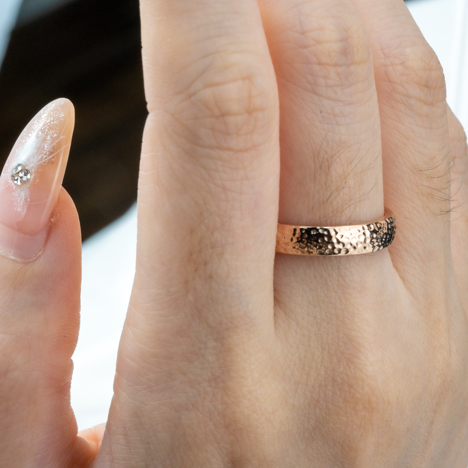 Stylish promise ring crafted in a classic hammered pattern, perfect for making a lasting commitment.
