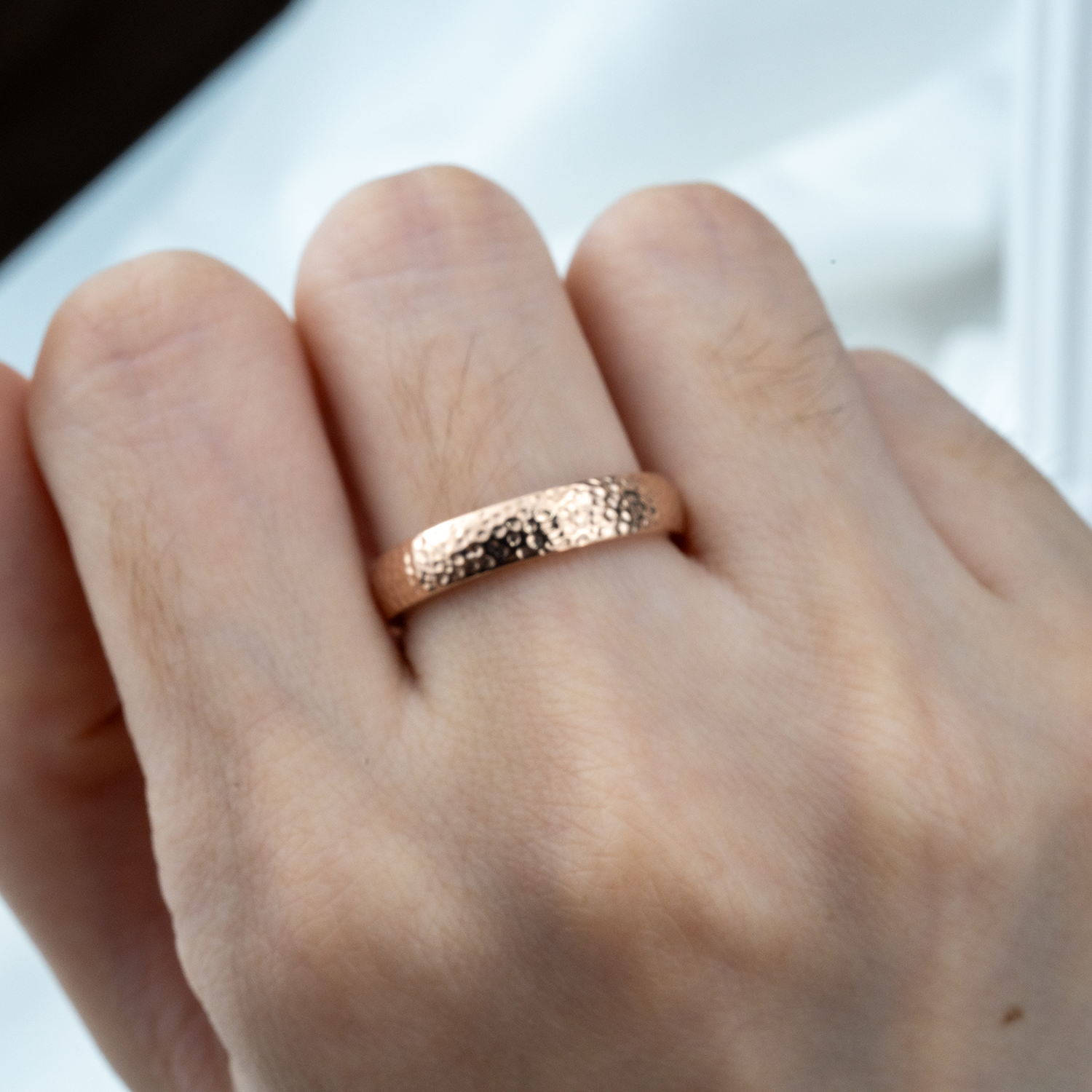 Stylish promise ring crafted in a classic hammered pattern, perfect for making a lasting commitment.