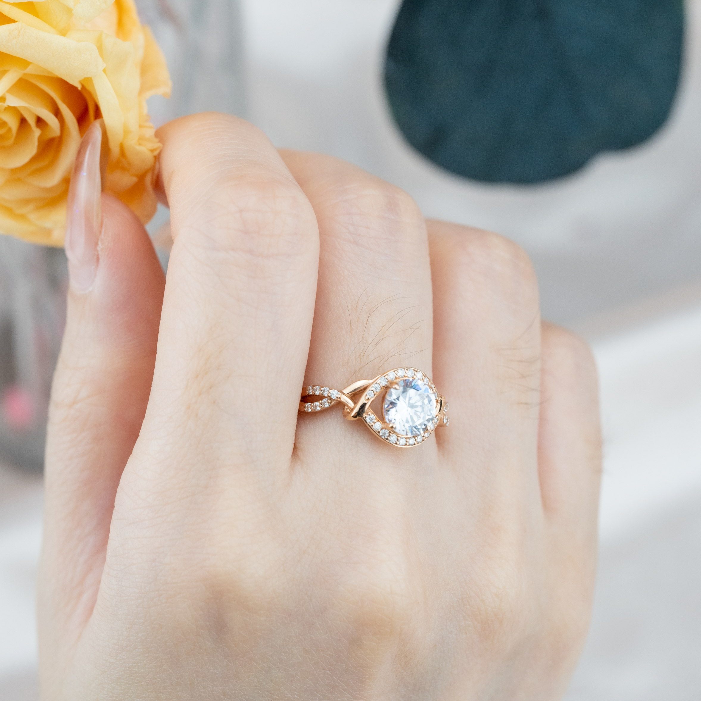 Moissanite round ring in rose gold setting for elegant style