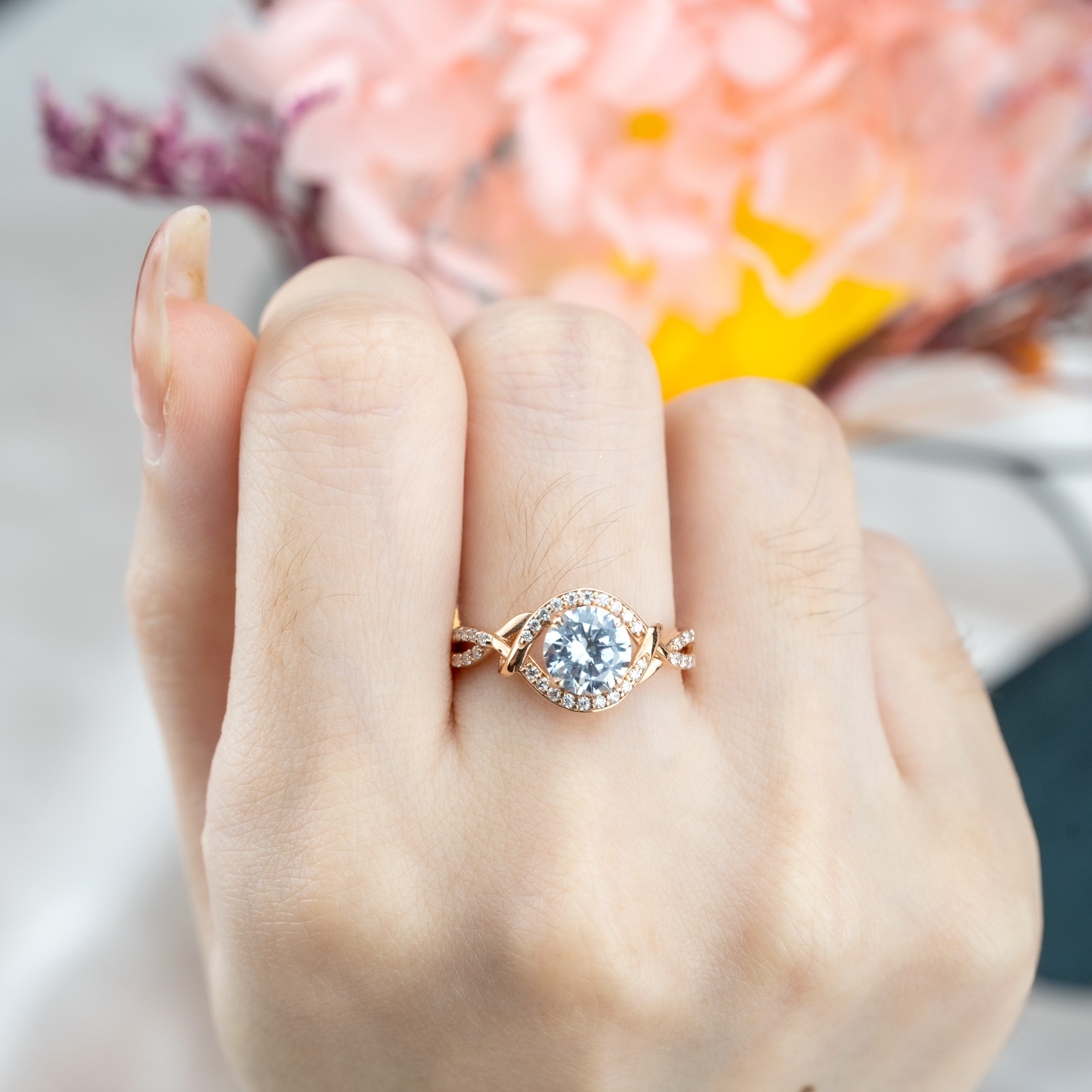 Moissanite round ring in rose gold setting for elegant style