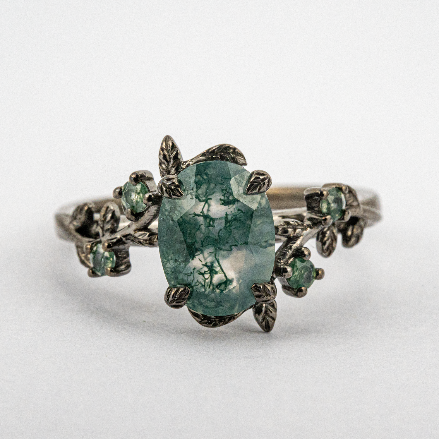 Oval Moss Agate Black Gold Ring - Elegant jewelry piece crafted with unique moss agate gemstone