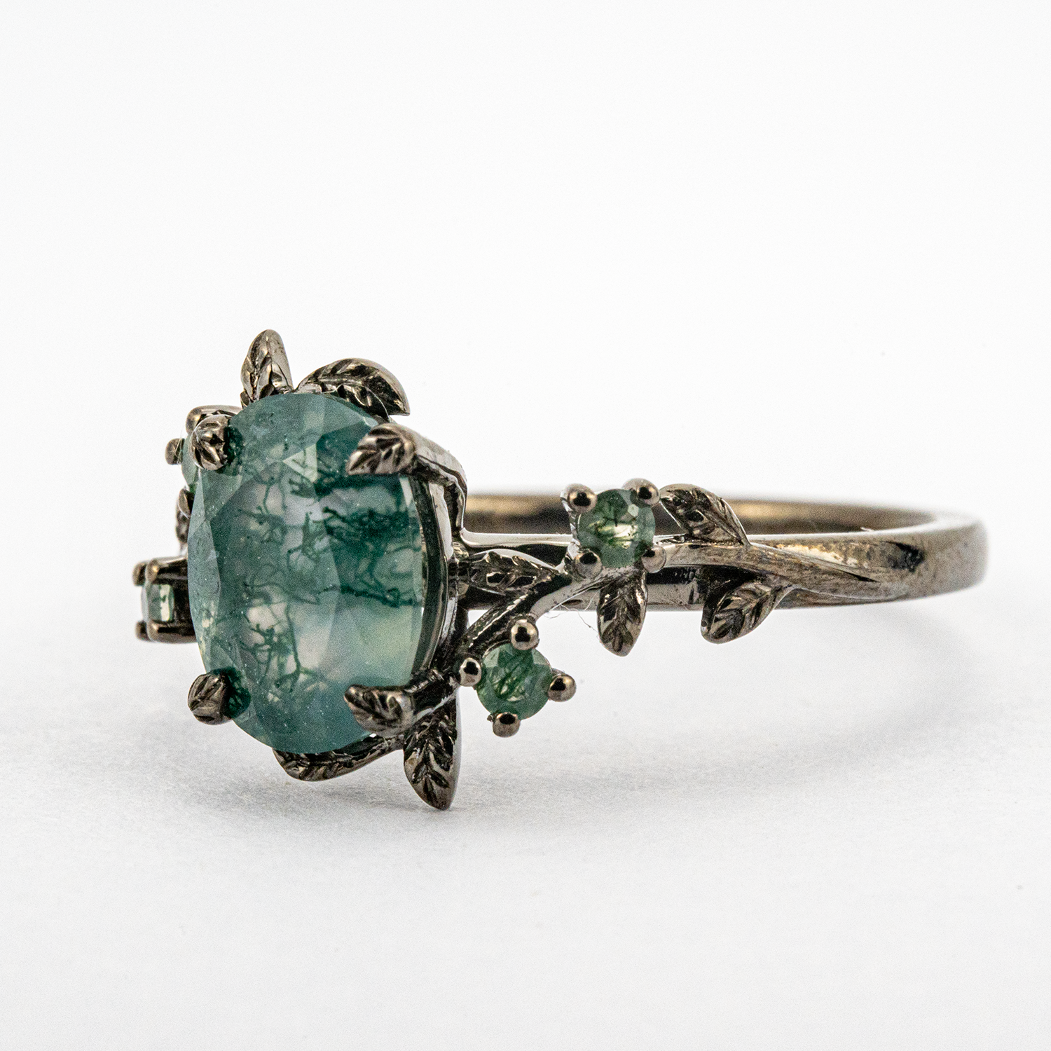 Oval Moss Agate Black Gold Ring - Elegant jewelry piece crafted with unique moss agate gemstone