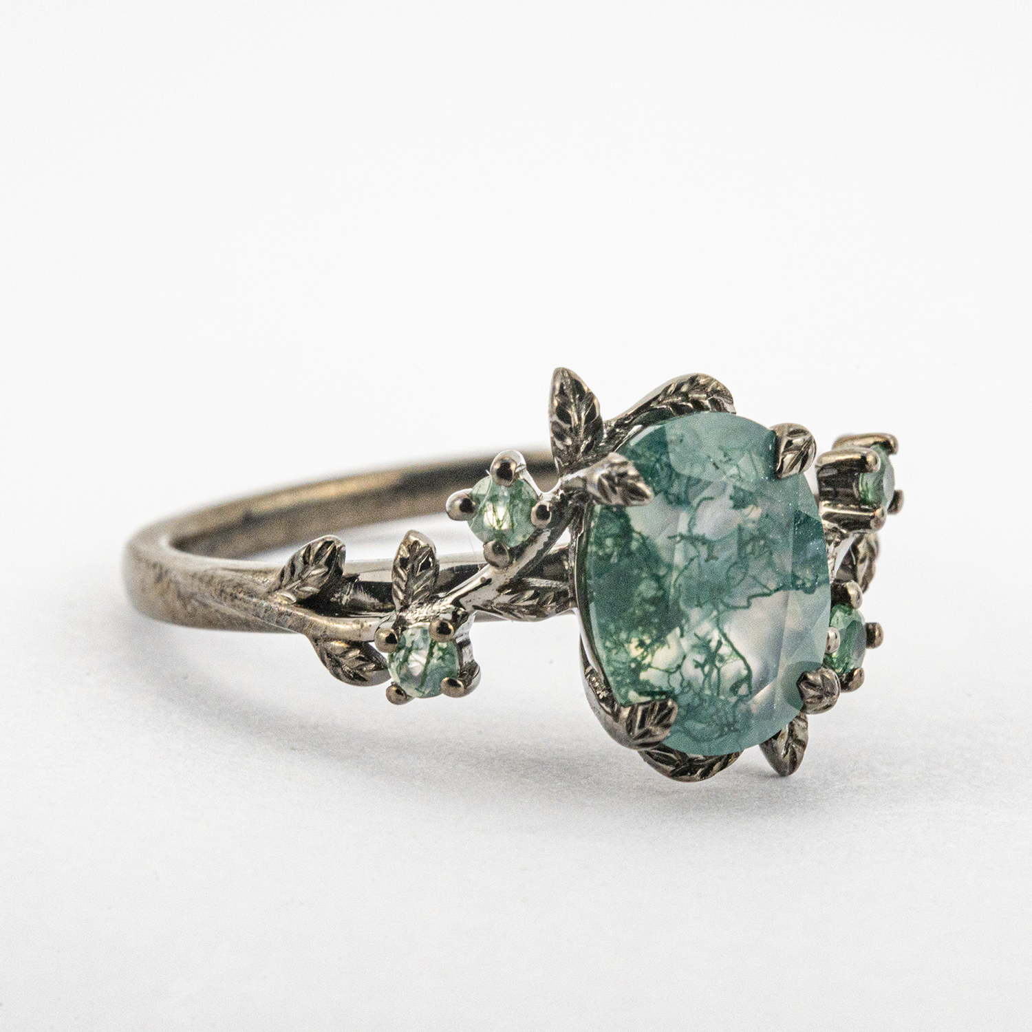 Oval Moss Agate Black Gold Ring - Elegant jewelry piece crafted with unique moss agate gemstone