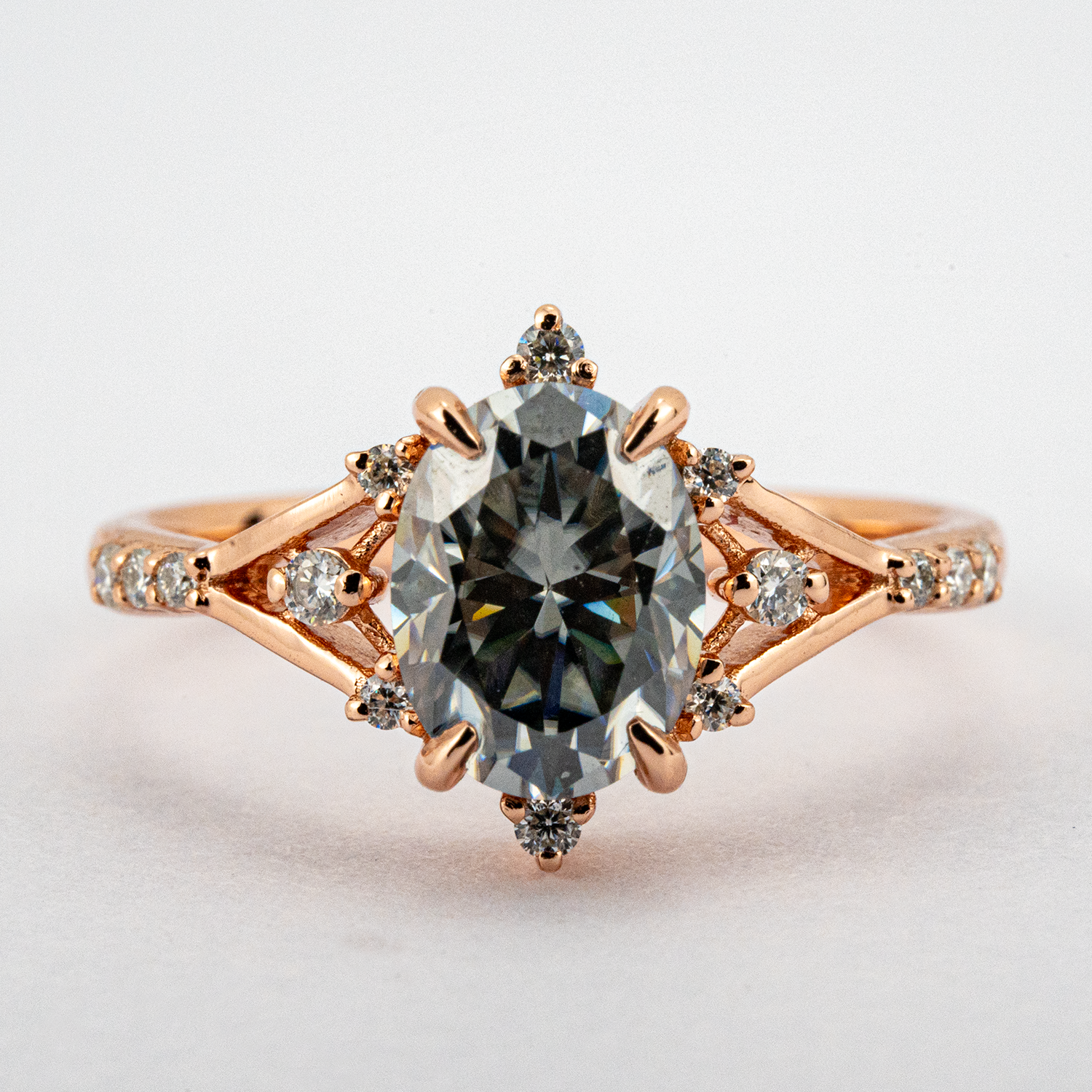 Stylish minimalist wedding band featuring an oval gray stone, chic design