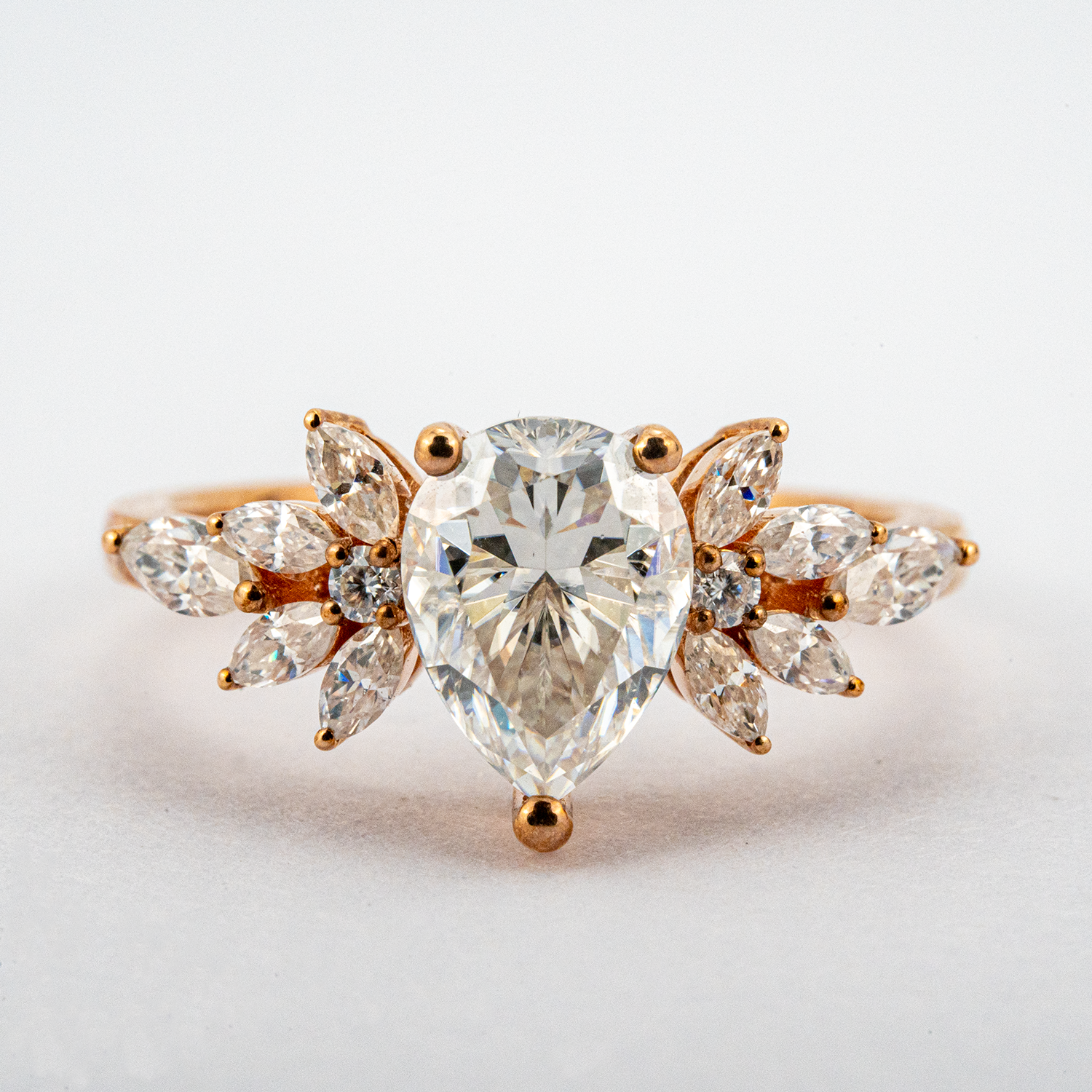 Luxurious Pear Moissanite Engagement Ring with intricate Butterfly design