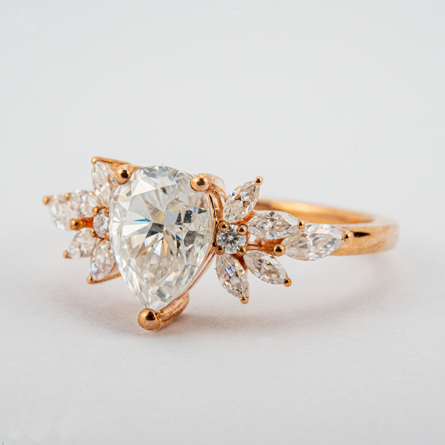 Luxurious Pear Moissanite Engagement Ring with intricate Butterfly design