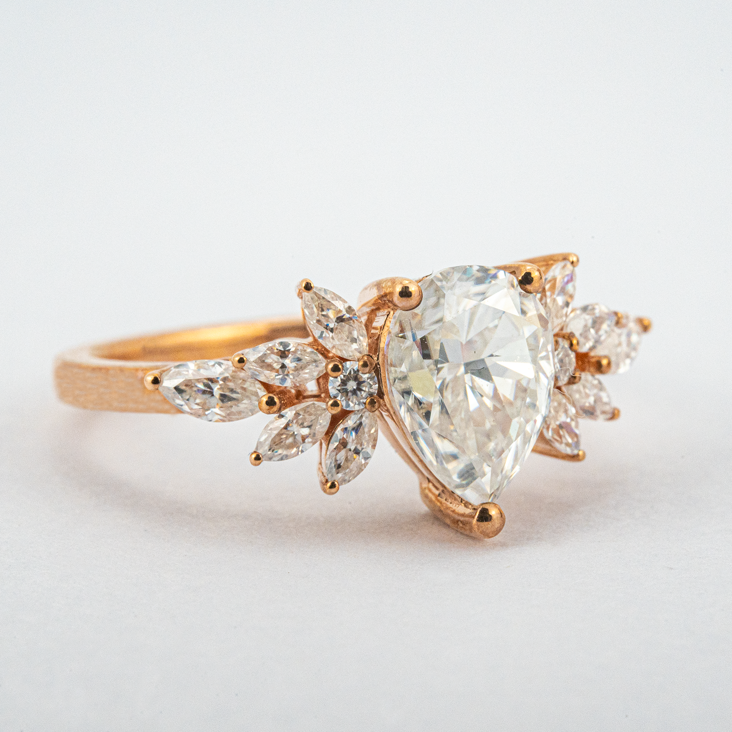 Luxurious Pear Moissanite Engagement Ring with intricate Butterfly design
