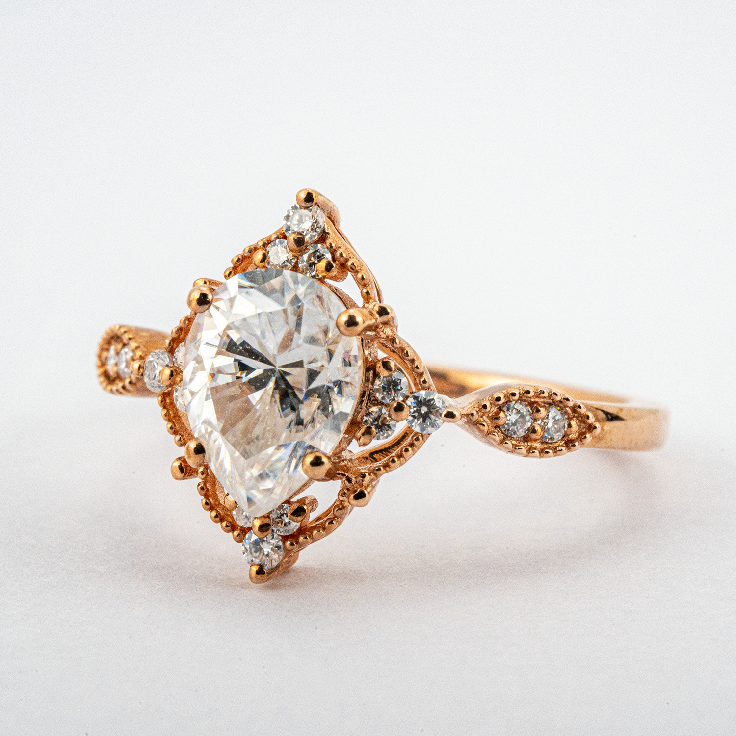 Exquisite pear Moissanite ring in stunning rose gold, perfect for vintage-inspired engagement