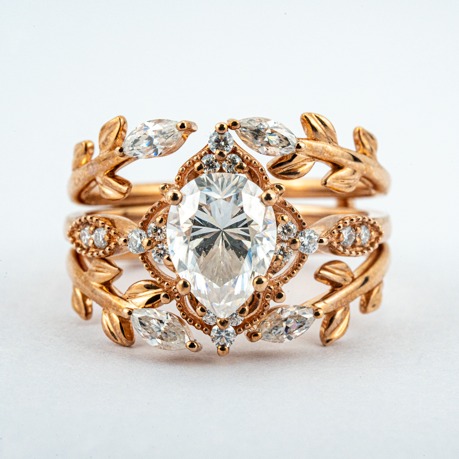 Make a statement with our luxurious selection of Anniversary Rings, crafted from the finest materials like Pear Moissanite and 18k gold.