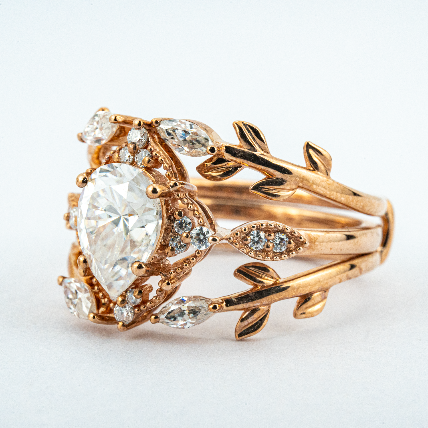 Make a statement with our luxurious selection of Anniversary Rings, crafted from the finest materials like Pear Moissanite and 18k gold.