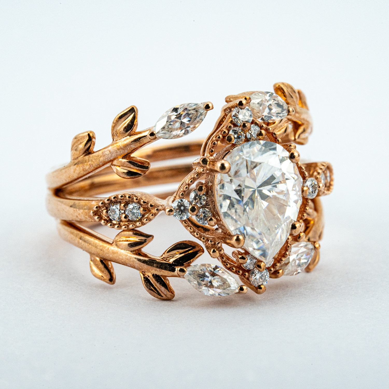 Make a statement with our luxurious selection of Anniversary Rings, crafted from the finest materials like Pear Moissanite and 18k gold.