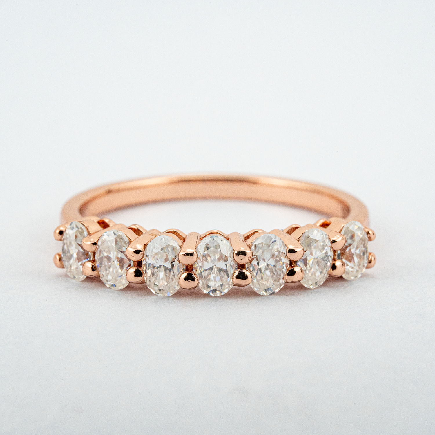 Oval Moissanite Band Wedding Ring - Unique design for sophisticated brides.