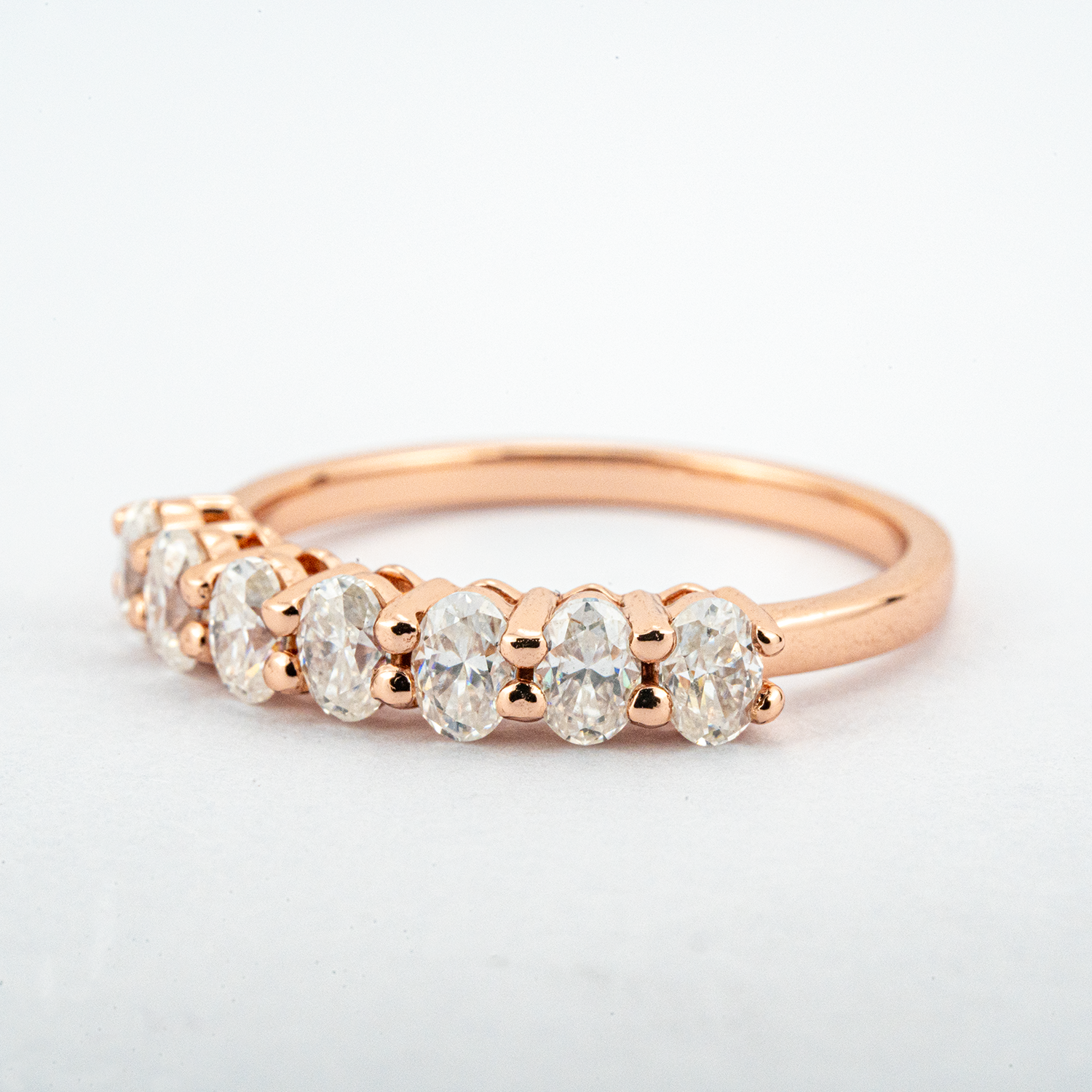 Oval Moissanite Band Wedding Ring - Unique design for sophisticated brides.