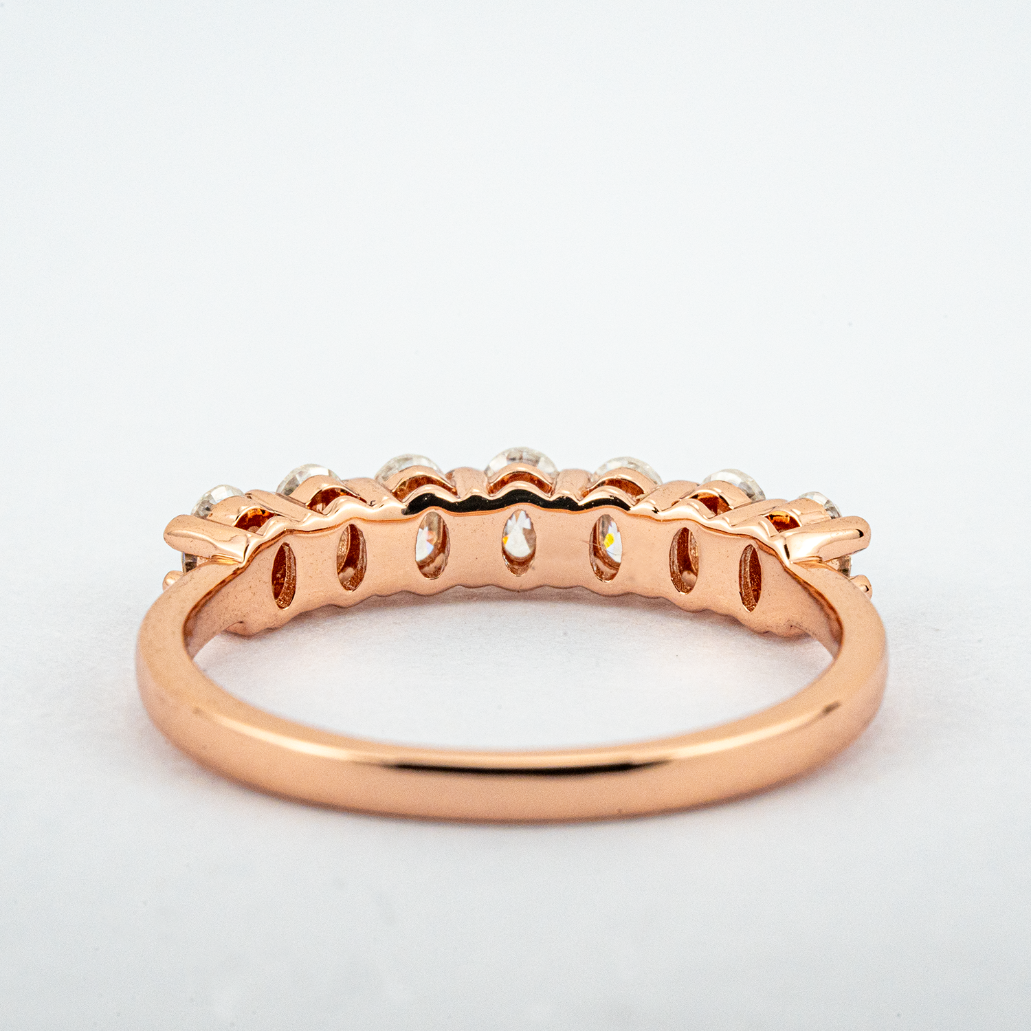 Oval Moissanite Band Wedding Ring - Unique design for sophisticated brides.