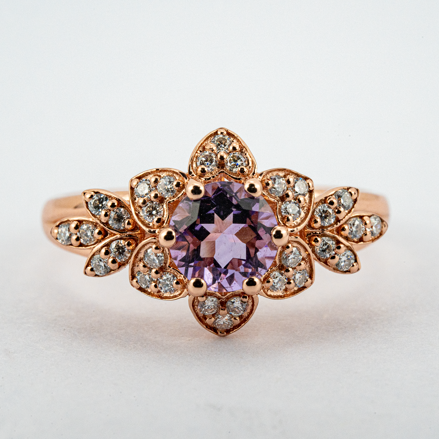 Exquisite round amethyst ring sparkling with luxury and elegance, perfect for a sophisticated touch.