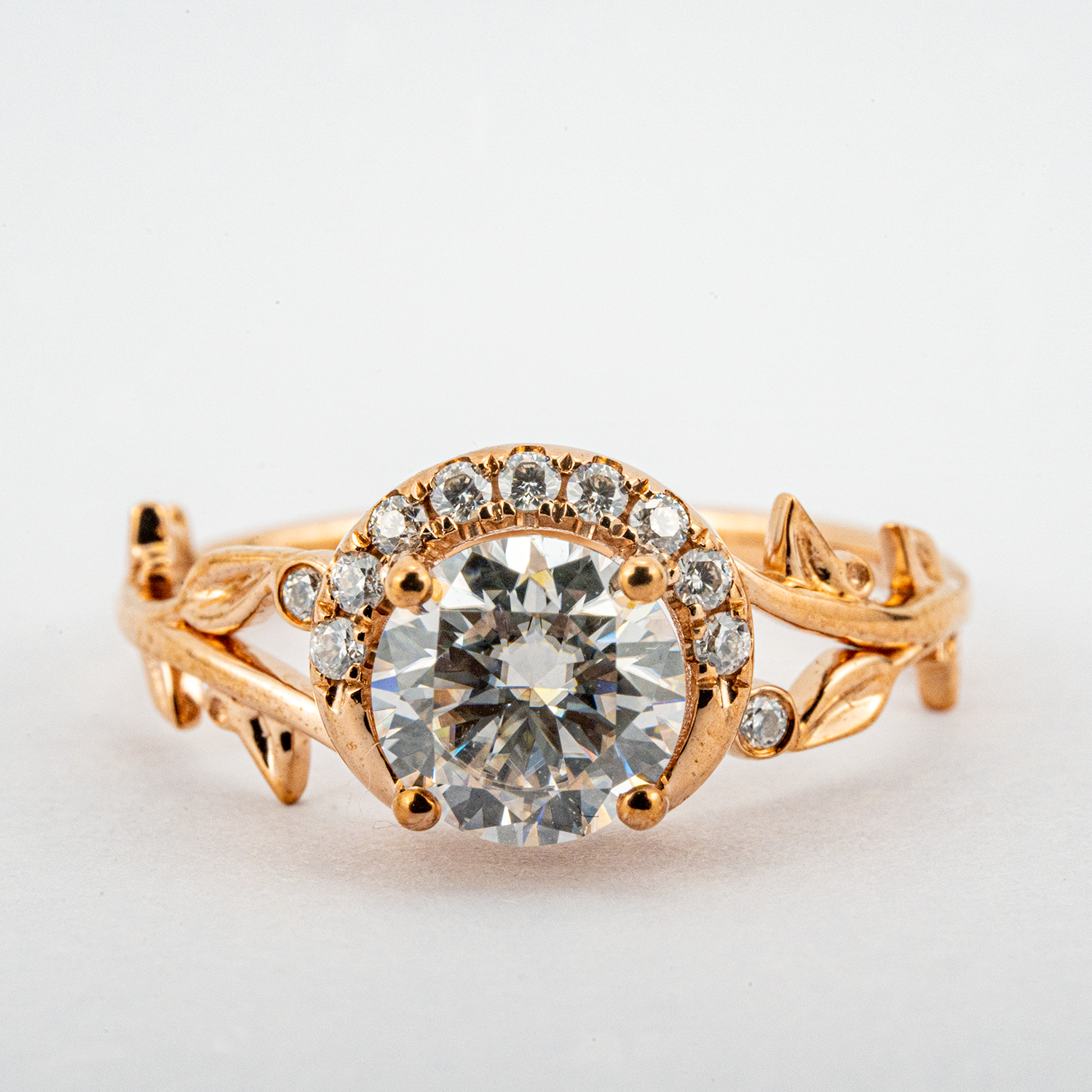 Elegant Rose Gold Leaf Ring featuring Round Moissanite Gemstone - Perfect for adding a touch of sophistication