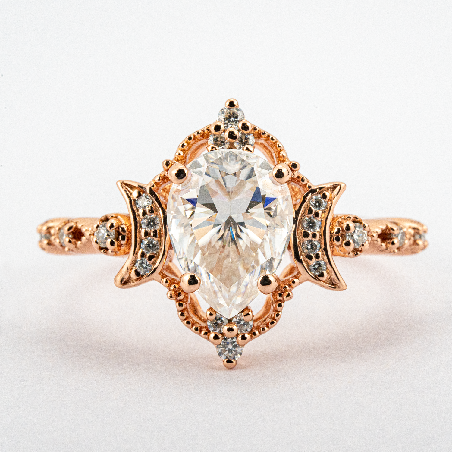 Pear Moissanite Crescent Moon Engagement Ring.
