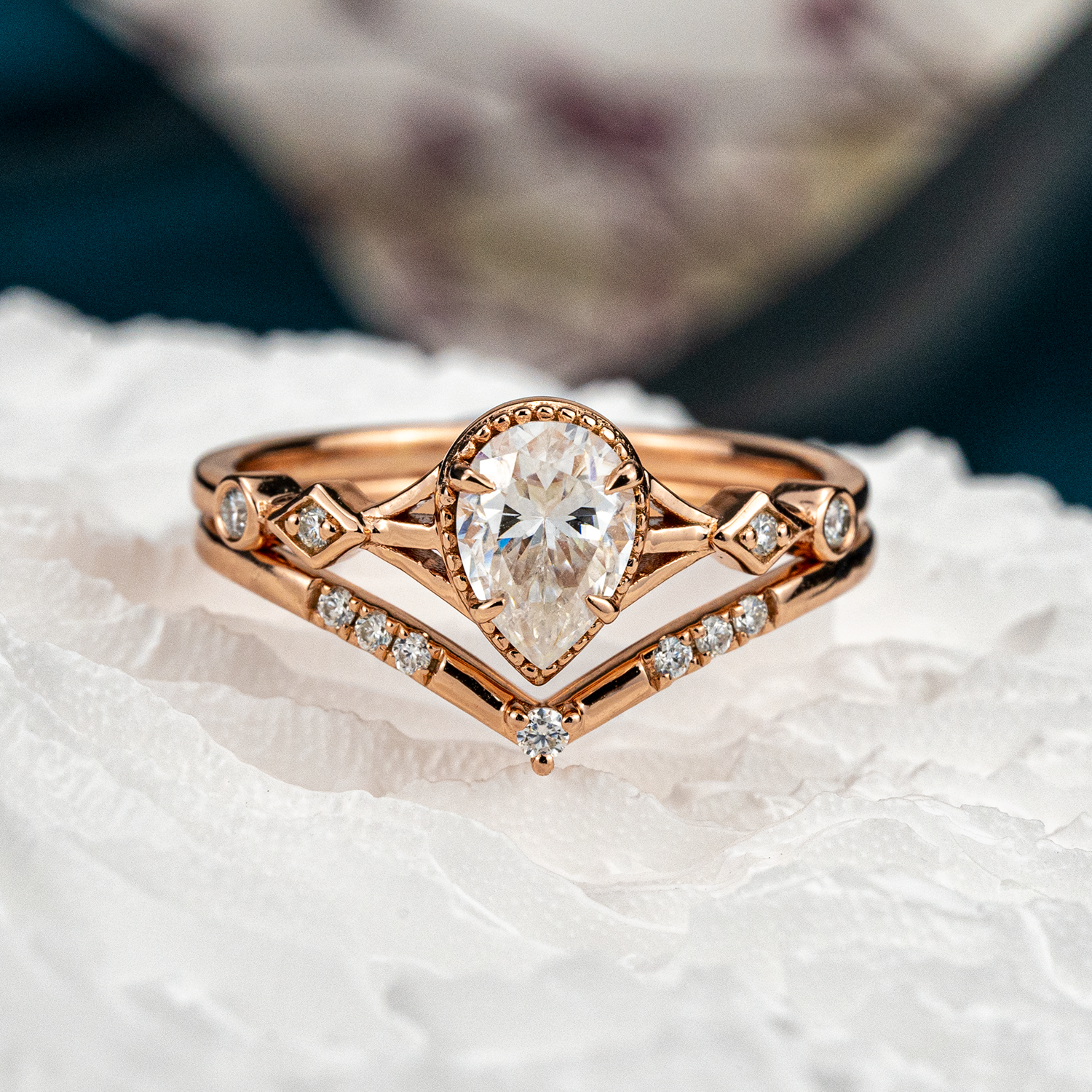 Stunning moissanite ring set with pear cut stones, showcasing timeless and classy design