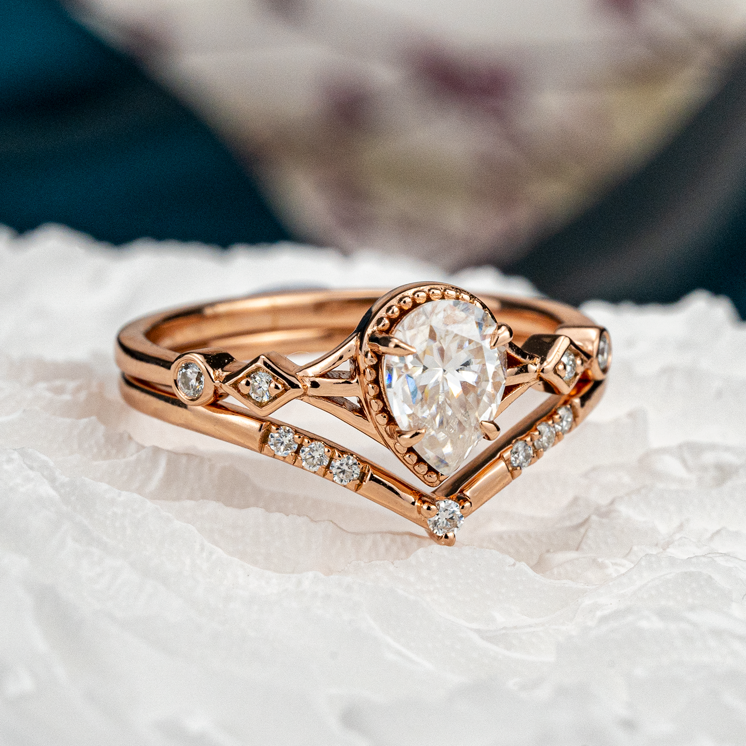 Stunning moissanite ring set with pear cut stones, showcasing timeless and classy design