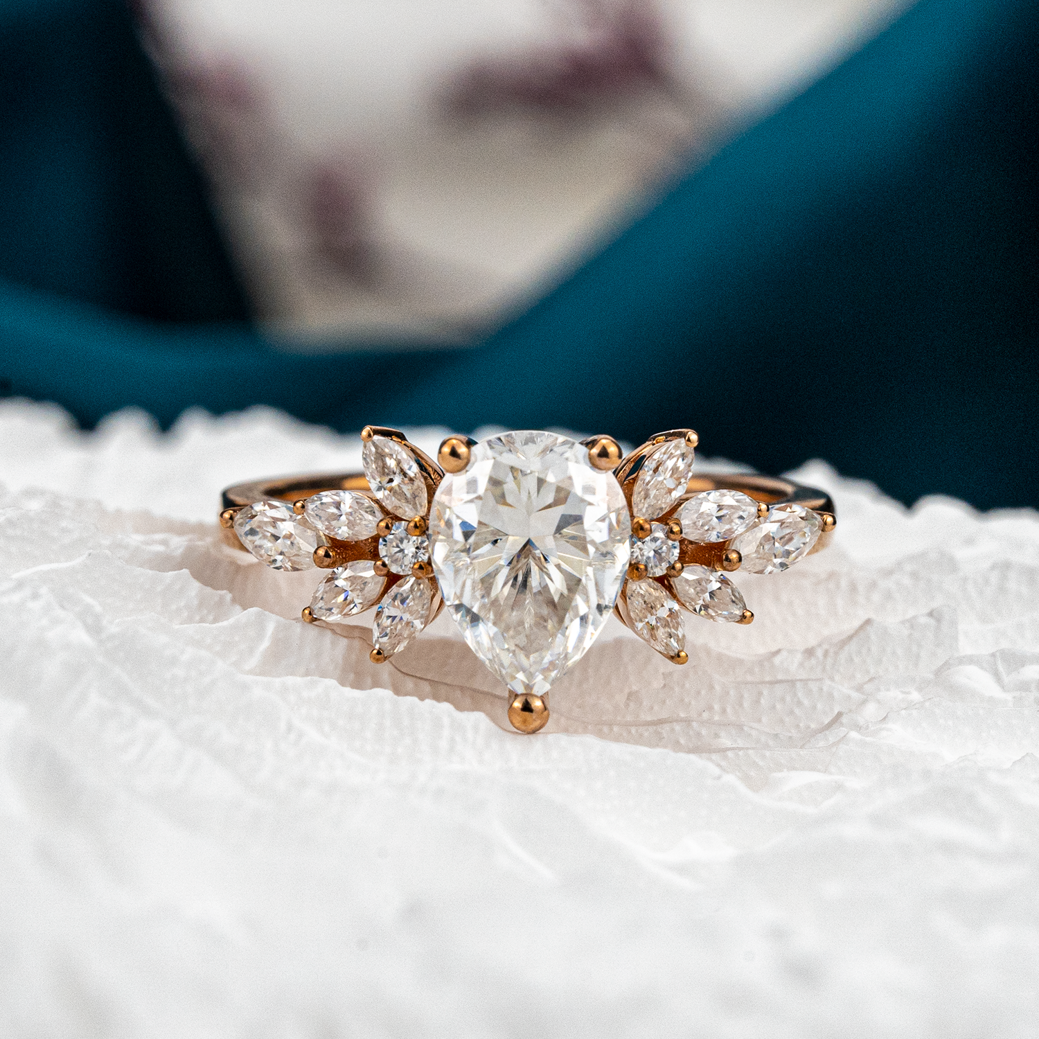 Luxurious Pear Moissanite Engagement Ring with intricate Butterfly design