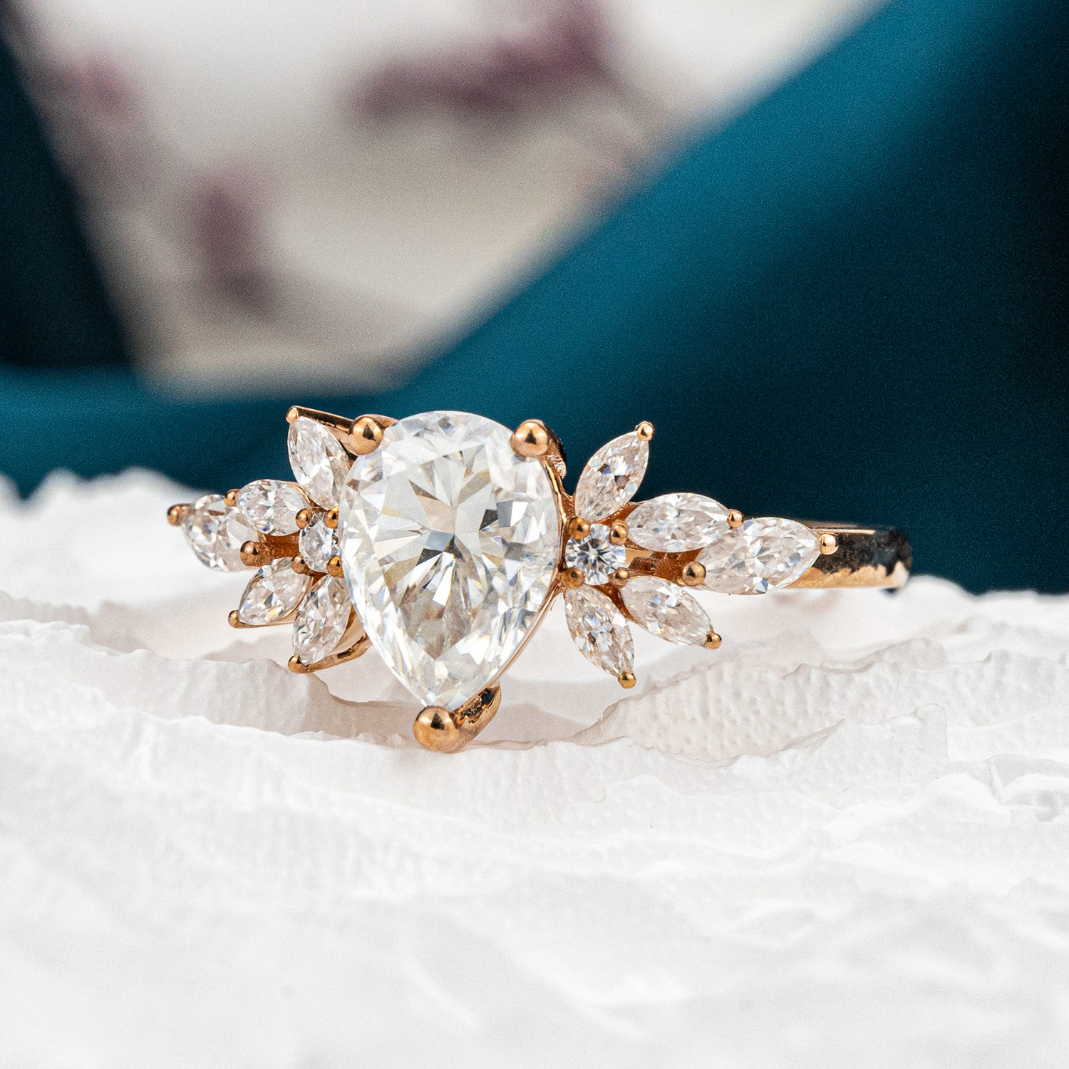 Luxurious Pear Moissanite Engagement Ring with intricate Butterfly design