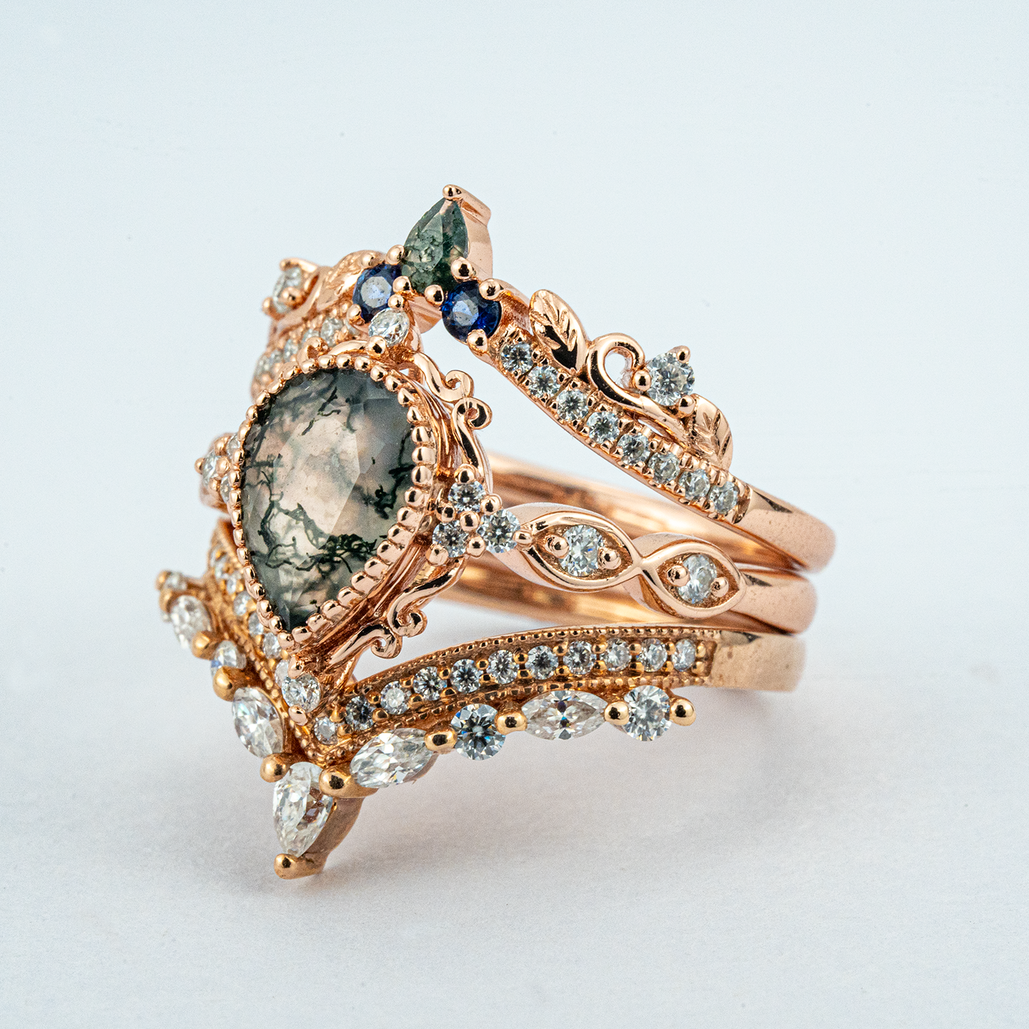 Exquisite wedding ring with pear moss agate stone, nature-inspired leaf design - luxurious and stunning