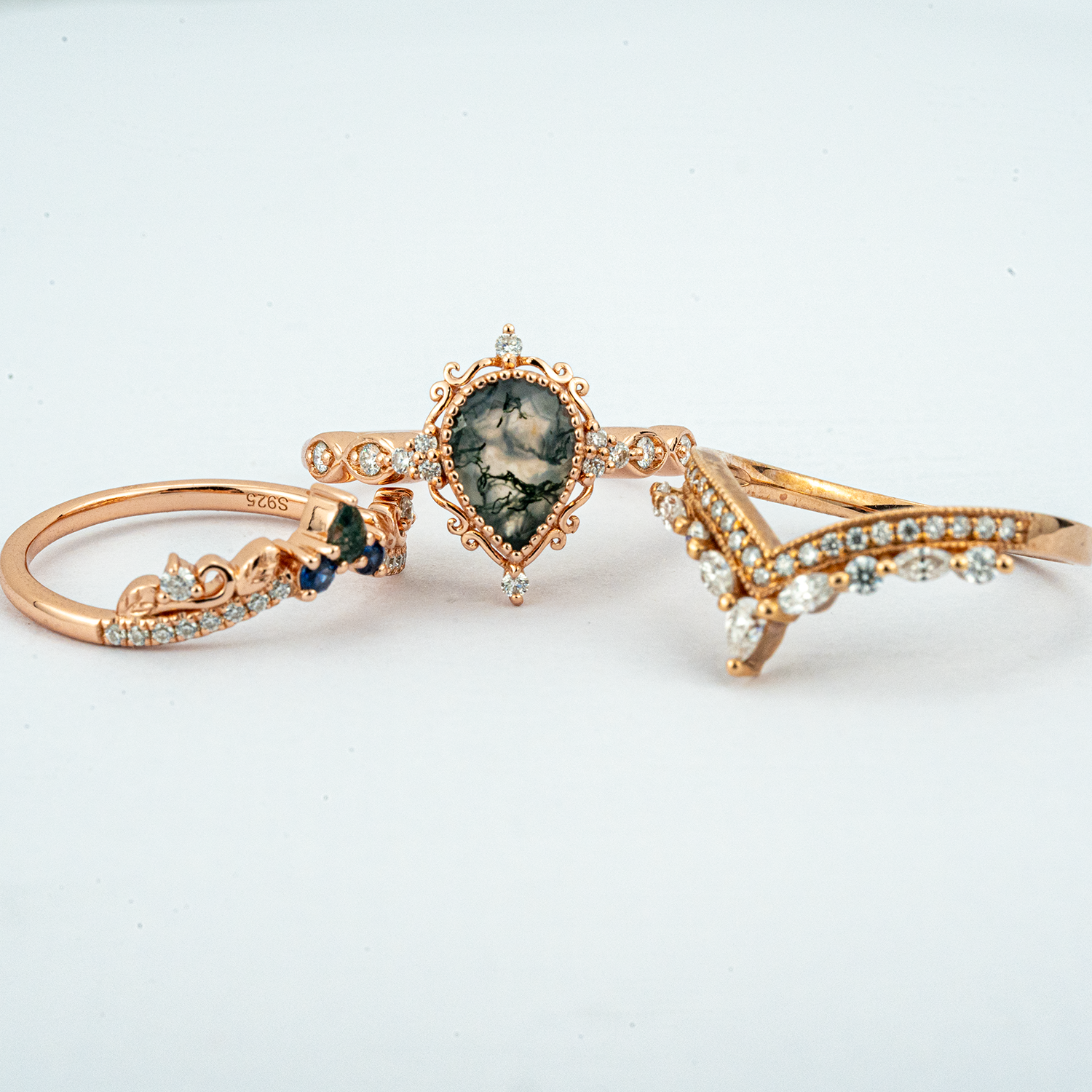 Exquisite wedding ring with pear moss agate stone, nature-inspired leaf design - luxurious and stunning