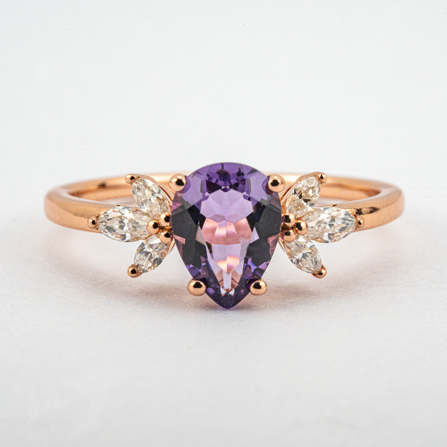 Elegant pear cut Alexandrite ring, the ultimate symbol of love and commitment.